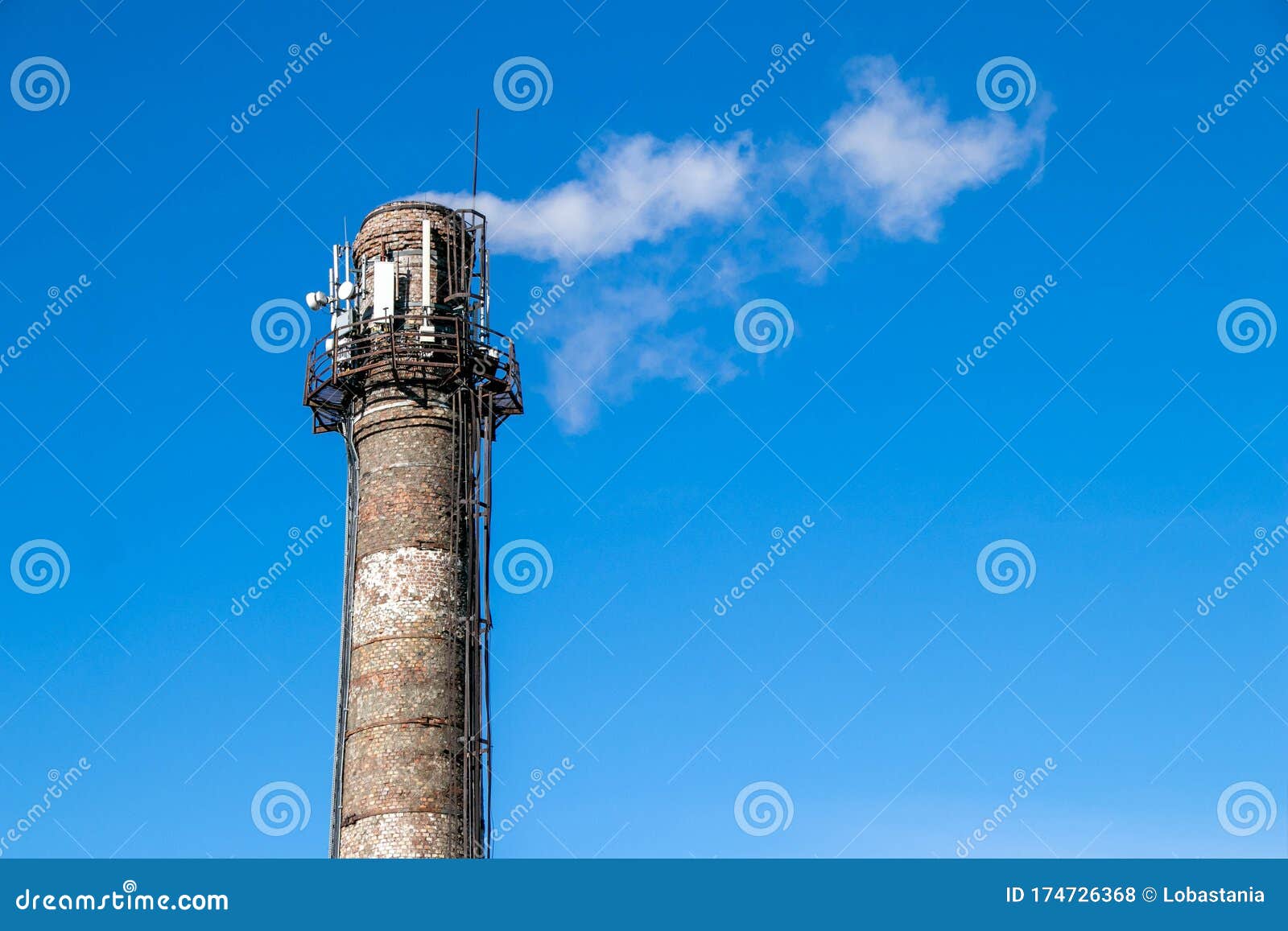 Brick Heating Pipe and Smoke from it Stock Photo Image of building