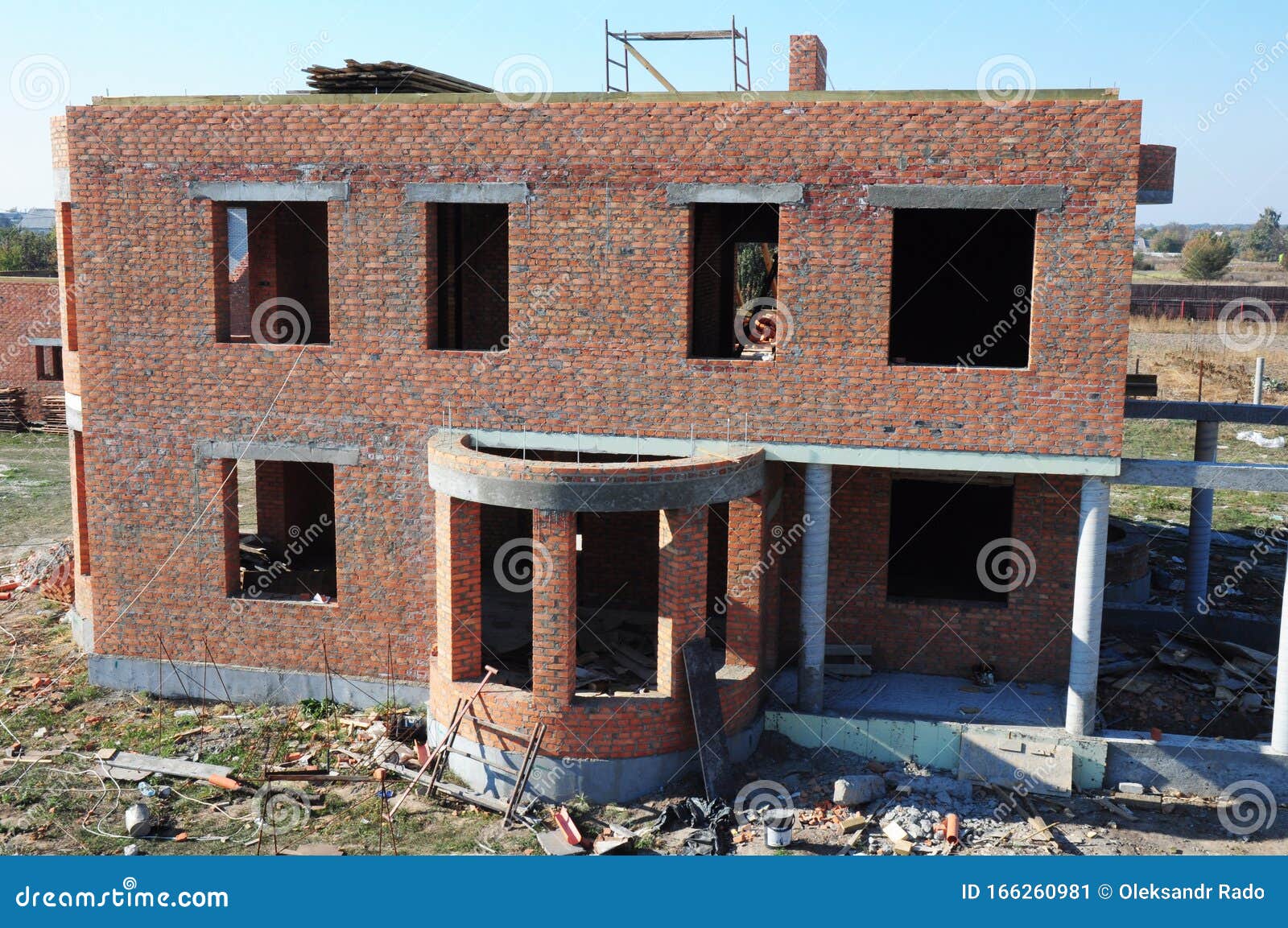 Brick House Under Construction. Luxury Brick House Wall Construction