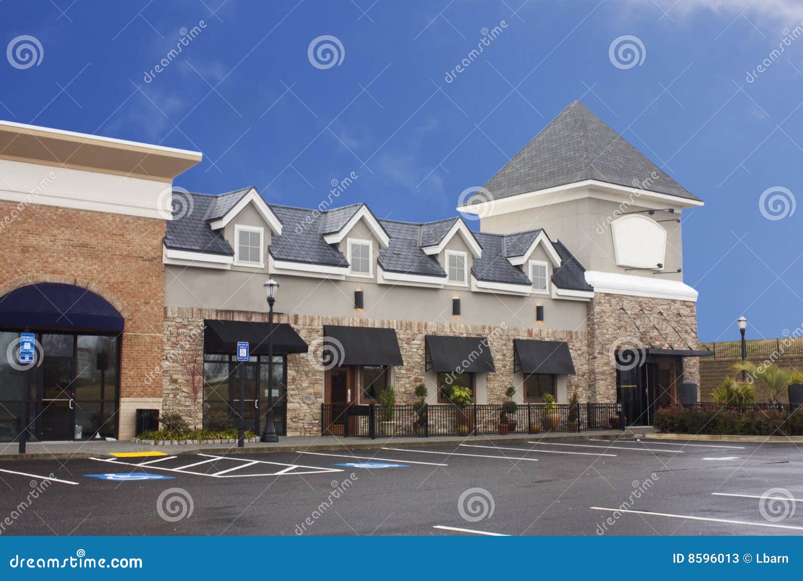 Brick upscale strip mall stock image. Image of business - 8596013