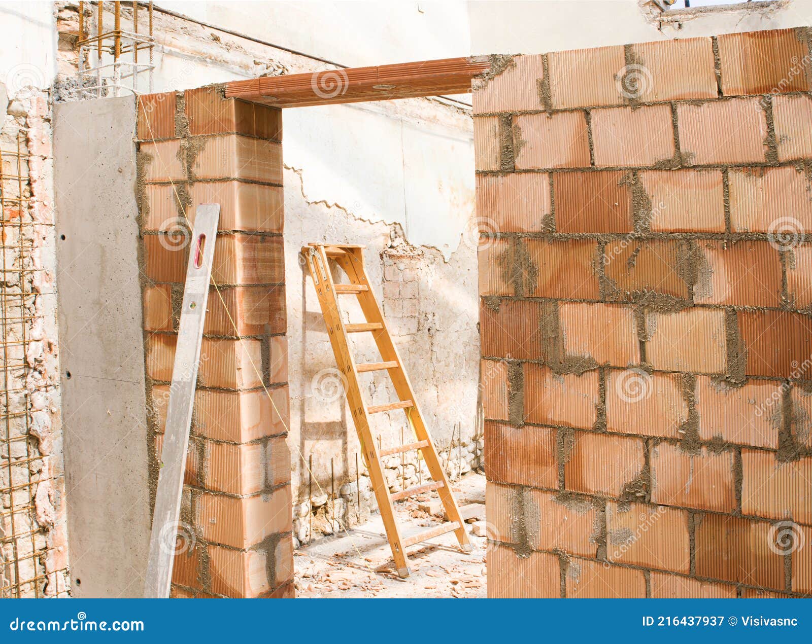 Brick Wall of a Construction Site with a Ladder in the Background Stock Image Image of ladder