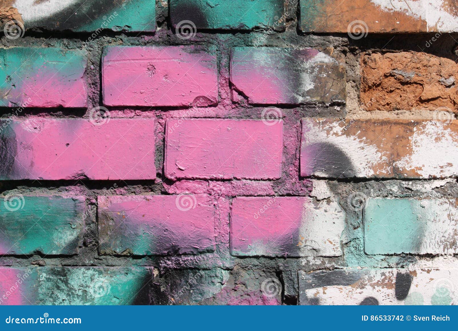 Brick wall with graffiti stock photo. Image of distressed 86533742