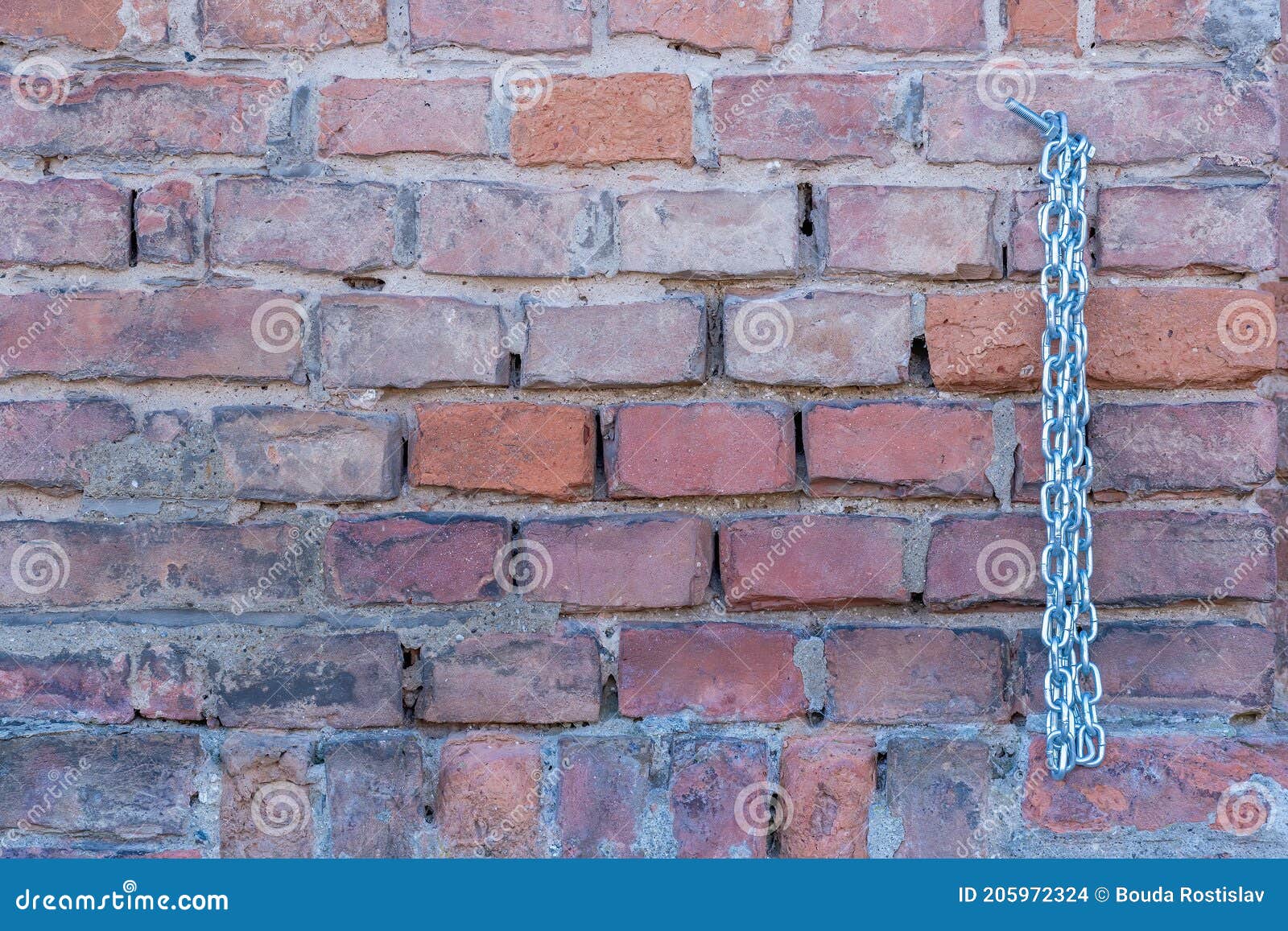 Brick Wall with a Hanging Shiny, New Chain Stock Photo - Image of crash ...