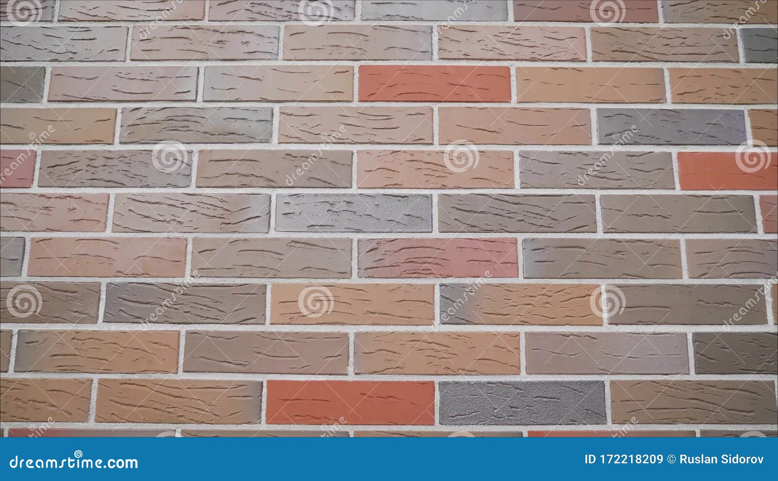 Brick Wall Made of Expensive Multicolored Bricks. Corner of a Textural