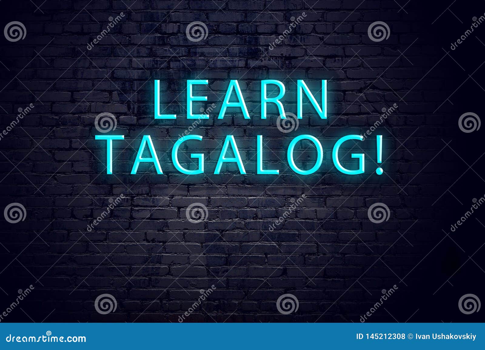 brick wall and neon sign with inscription. concept of learning tagalog