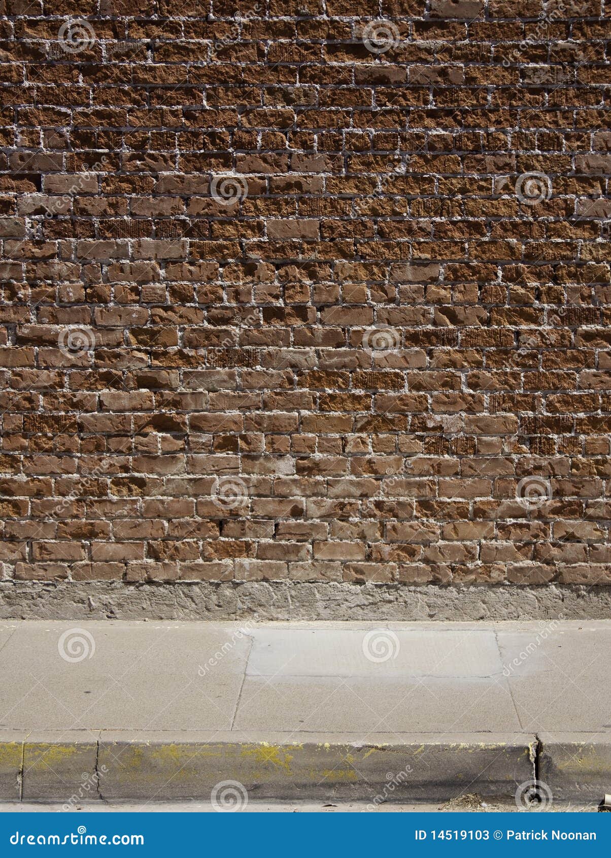 brick wall and sidewalk