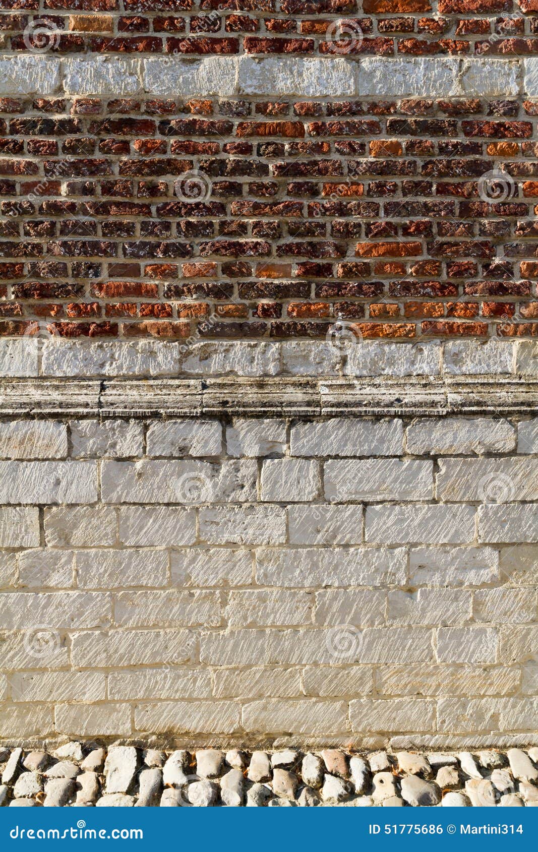 A Brick Wall with a Streak of Light of the Sun Creating a Textured Wall