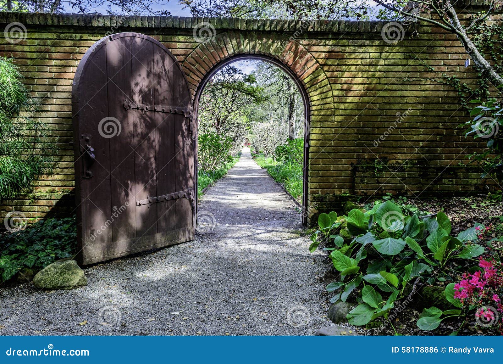 brick walled english garden arch gate