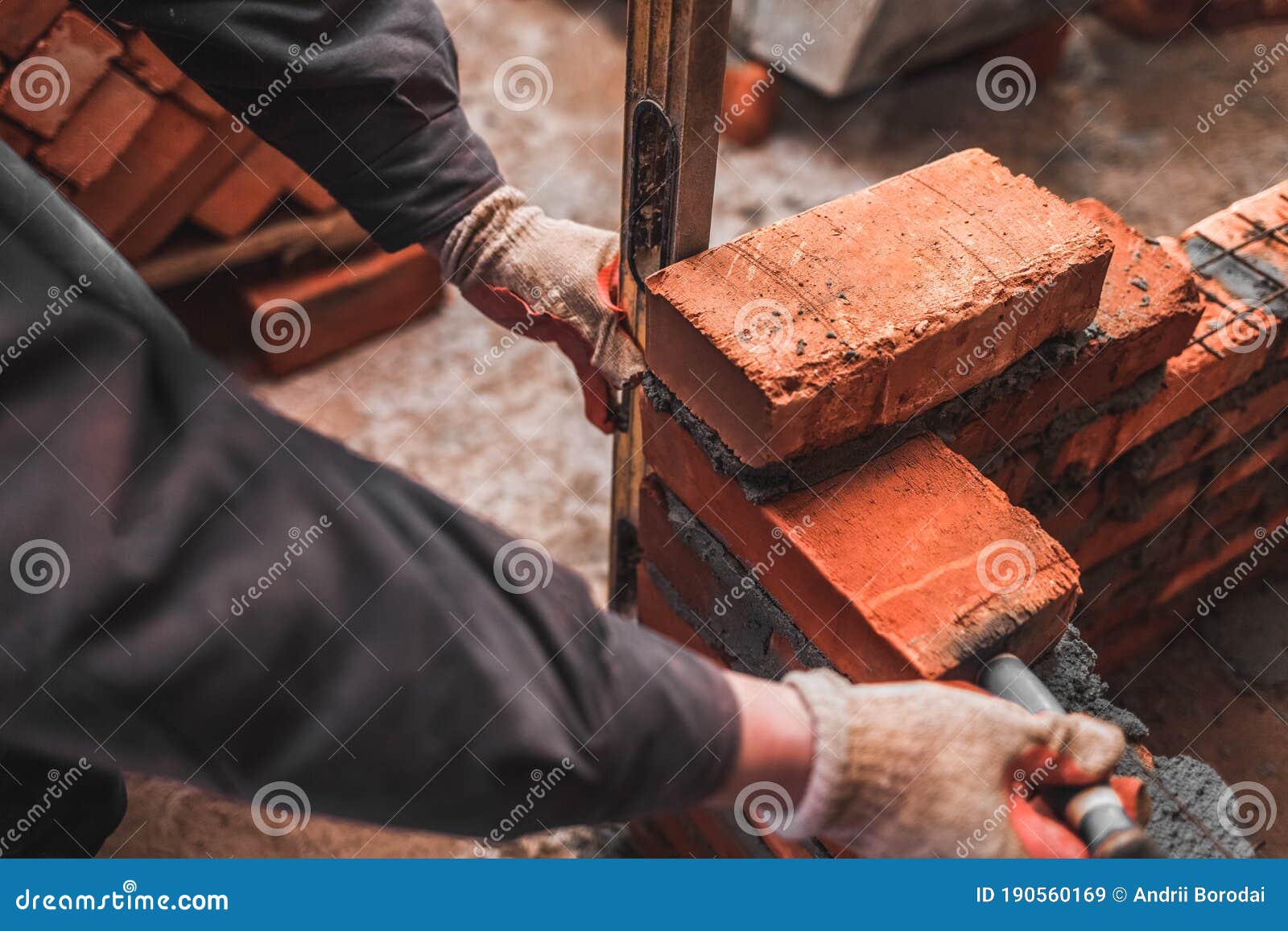 Bricklayer Puts Bricks To Make a Wall Stock Image Image of industry