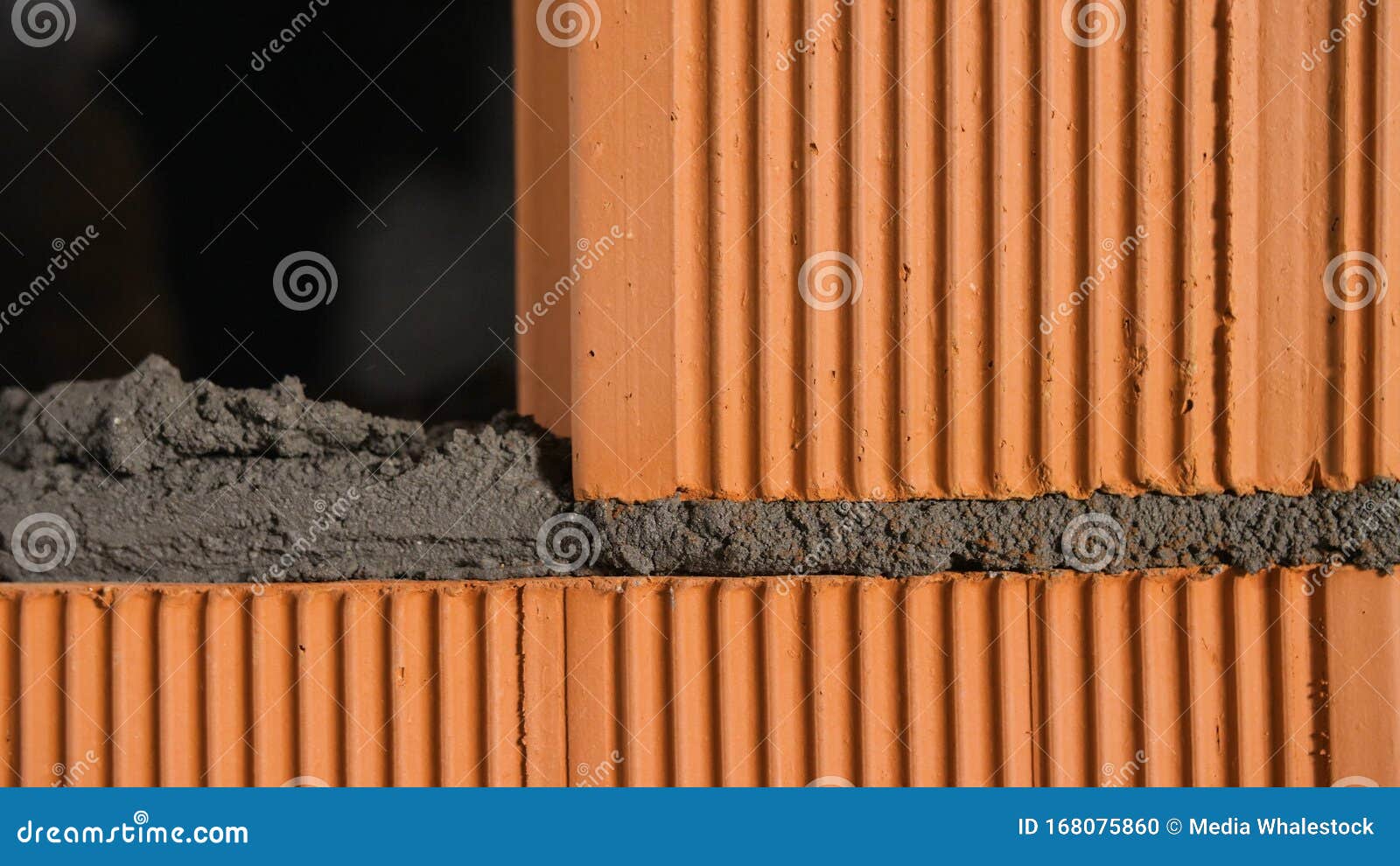 Bricklayer Tapping Down A Block Wall. Stock Footage. Construction