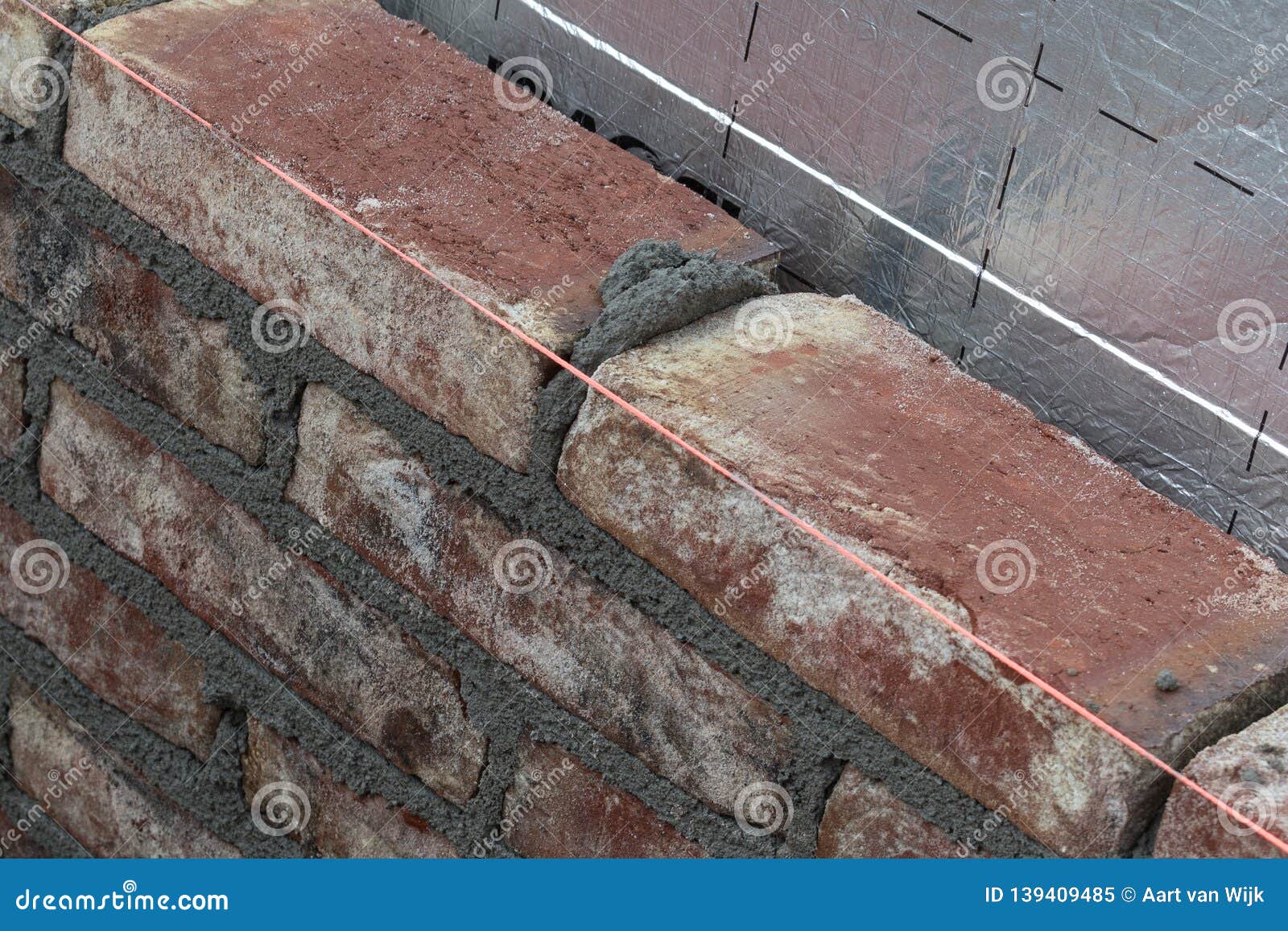 Bricks, Mortar and a Masonry Line Stock Image - Image of ceramic