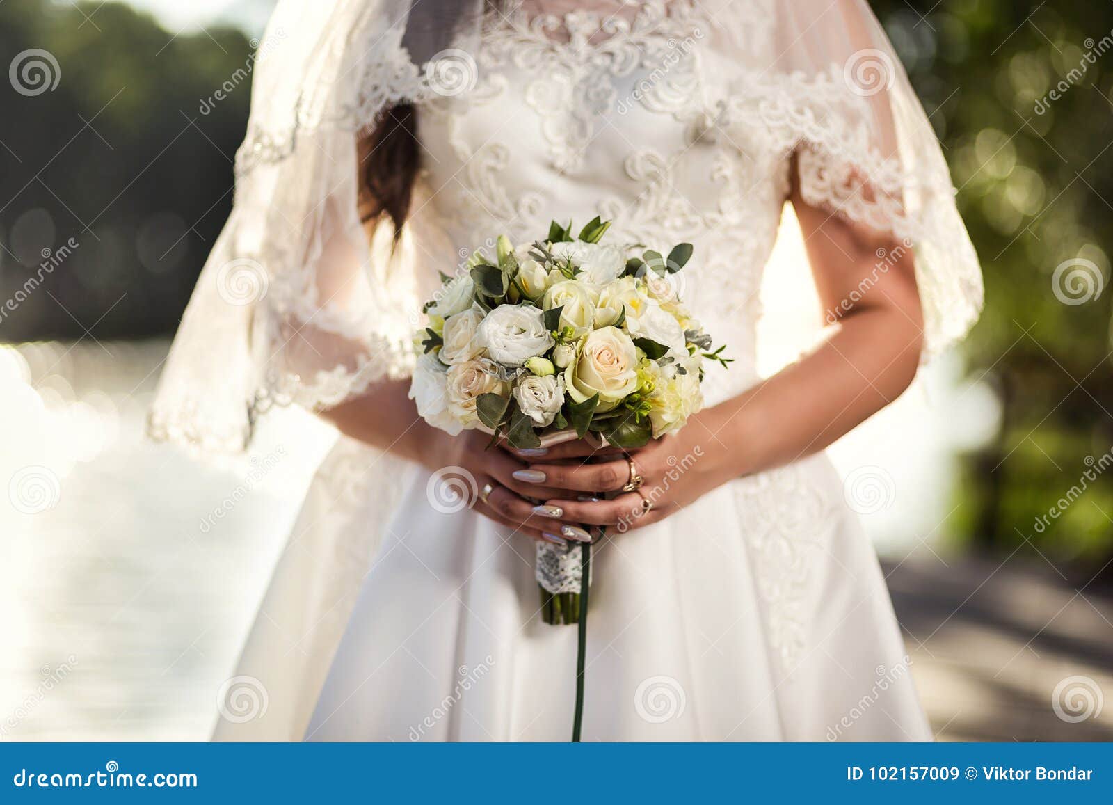 Bridal Bouquet in Hands of the Bride ...