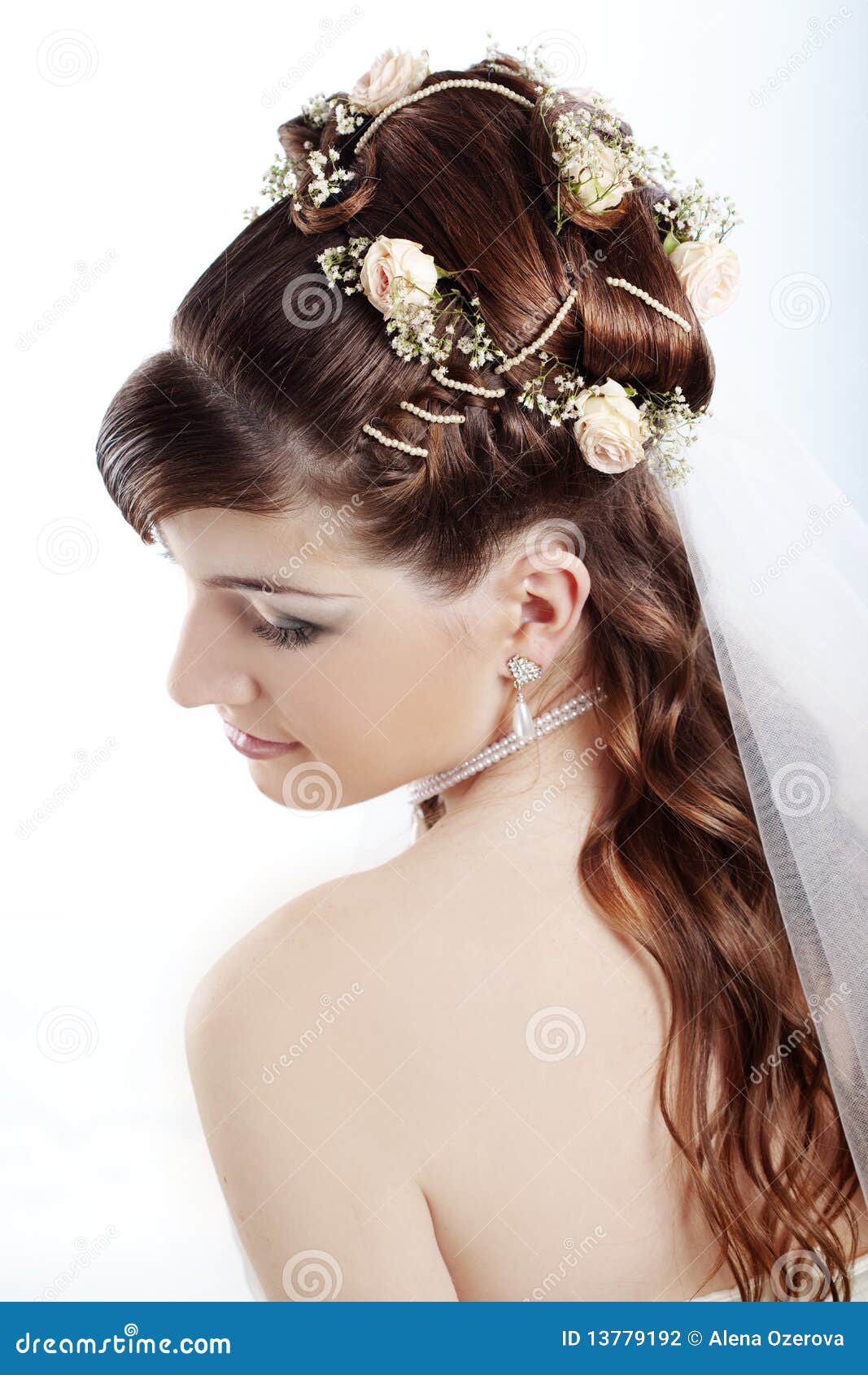 Young Beautiful Bride With An Elegant High Hairdo. Wedding Hairstyle With  The Accessory In Her Hair. Close-up Portrait On Light Background Stock  Photo, Picture and Royalty Free Image. Image 100272495.