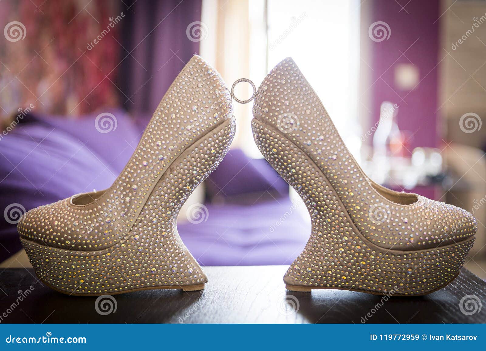 Bridal Ring of White Gold between Two Beautiful and Stylish Shoes ...