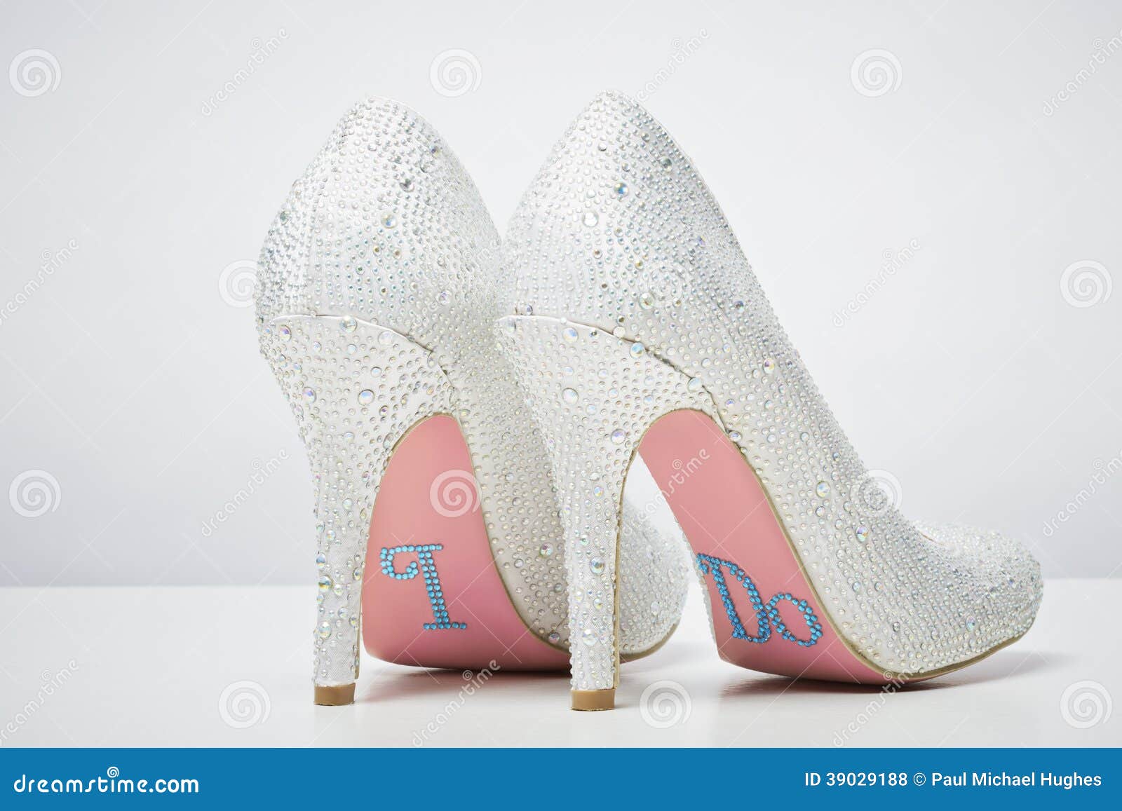 Bridal Wedding Shoes With I Do Message On Sole Isolated On White  Background. Marriage Concept Stock Photo, Picture and Royalty Free Image.  Image 26818048.