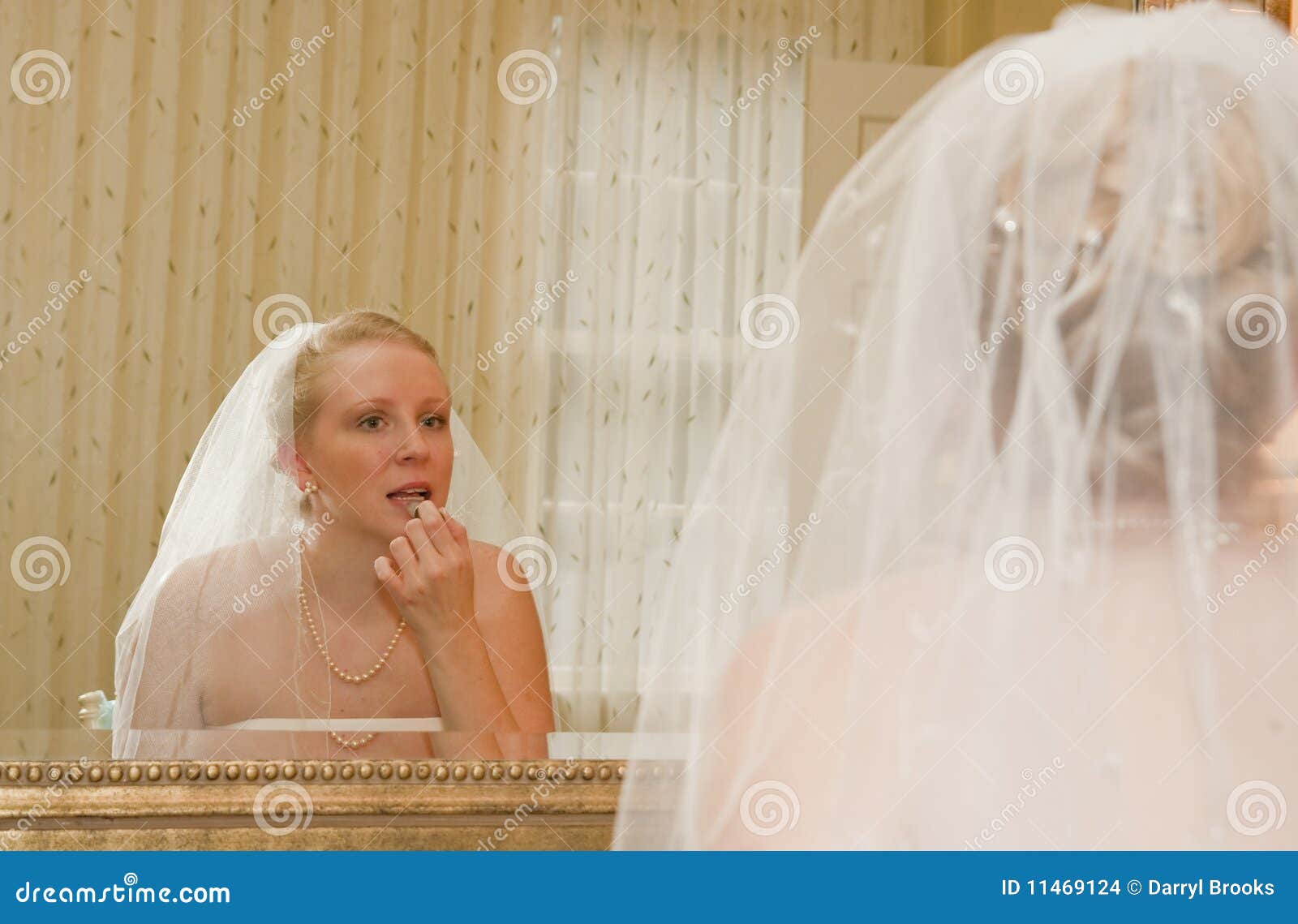 Bride Applying Lipstick stock photo. Image of gown, dress 11469124