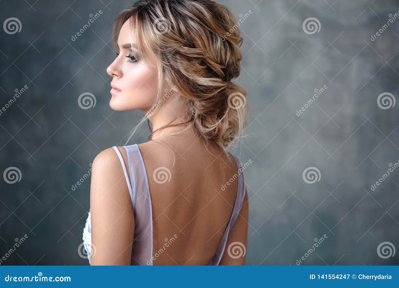 Bride Blonde Woman In A Modern Color Wedding Dress With Elegant