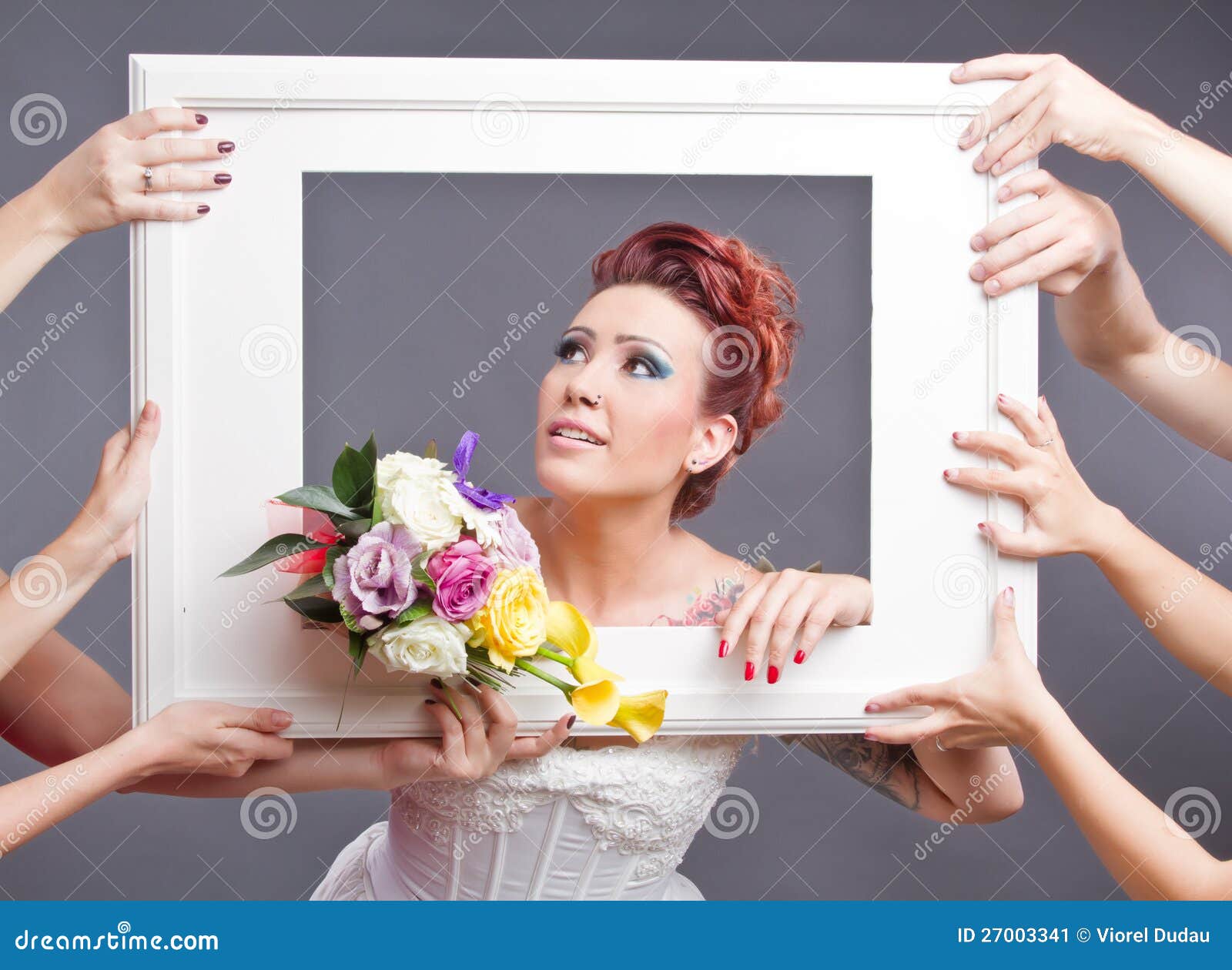 bride with bouquet in frame