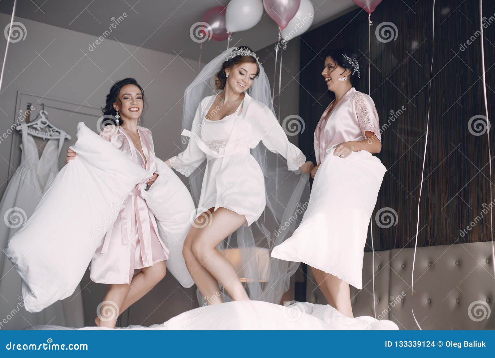 Bride with bridesmaid stock photo. Image of fashionable - 133339124