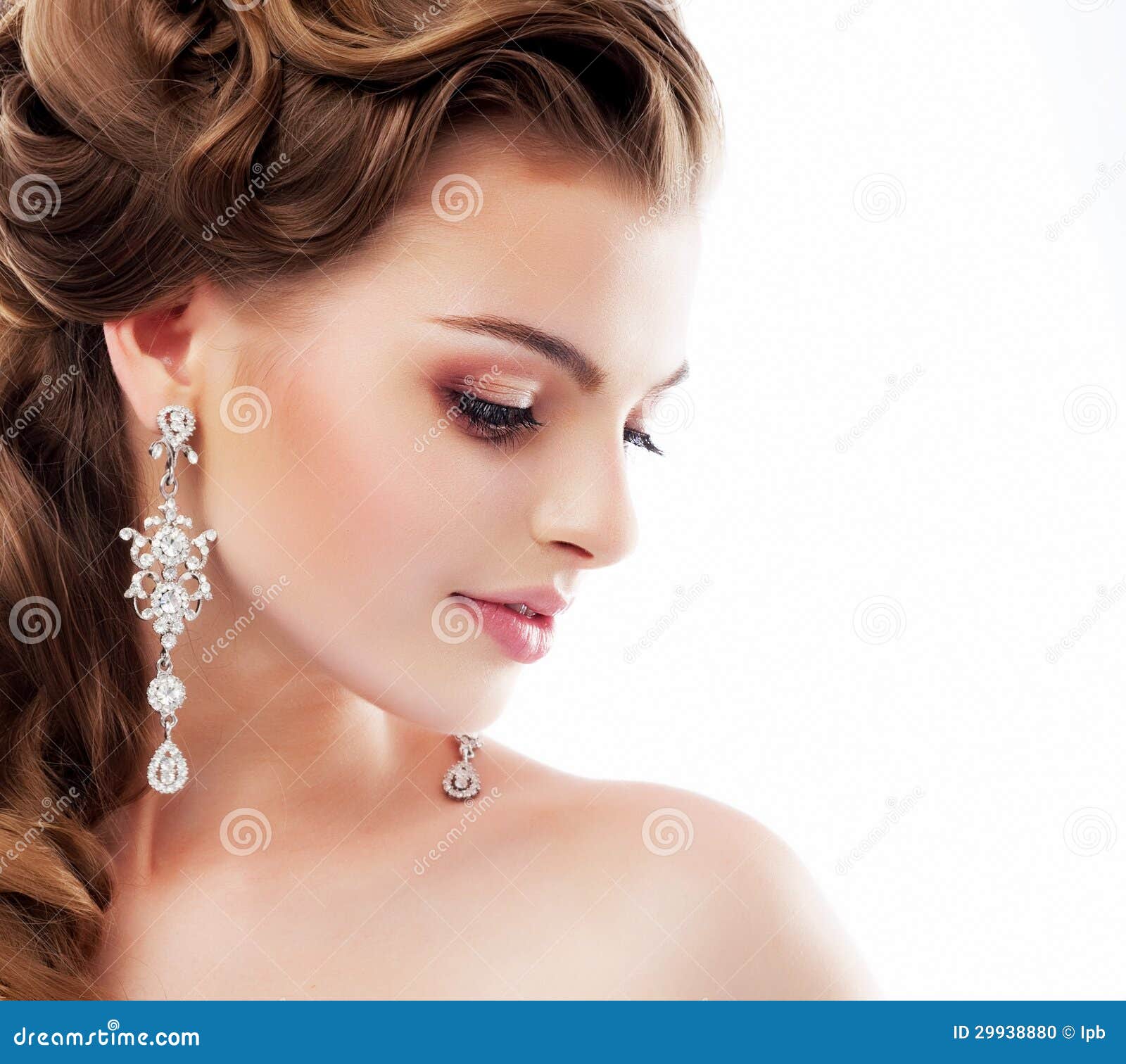 pure beauty. aristocratic profile of smiling lady with glossy diamond earrings. femininity & sophistication