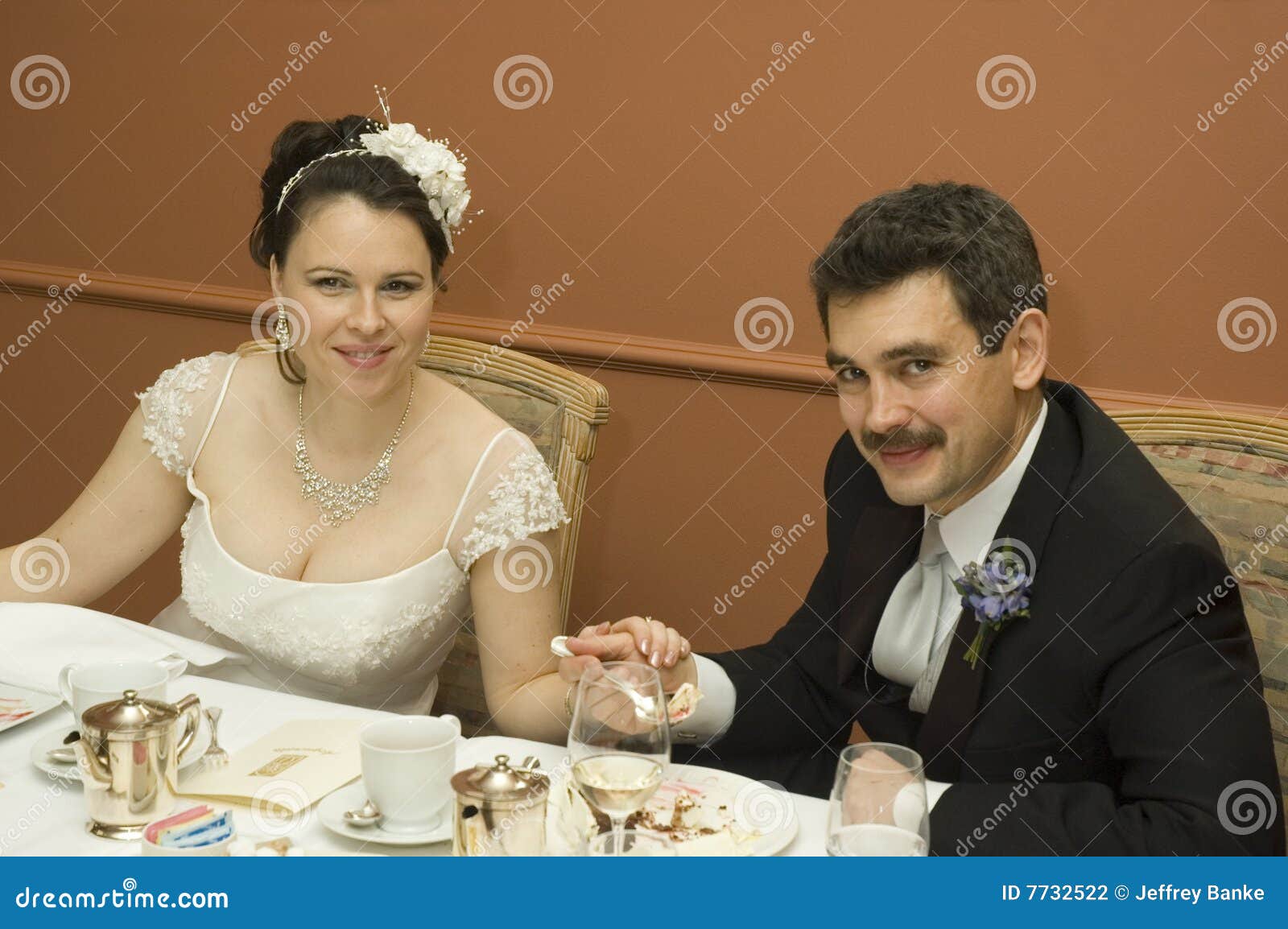 Bride and groom at dinner stock photo. Image of bride 7732522