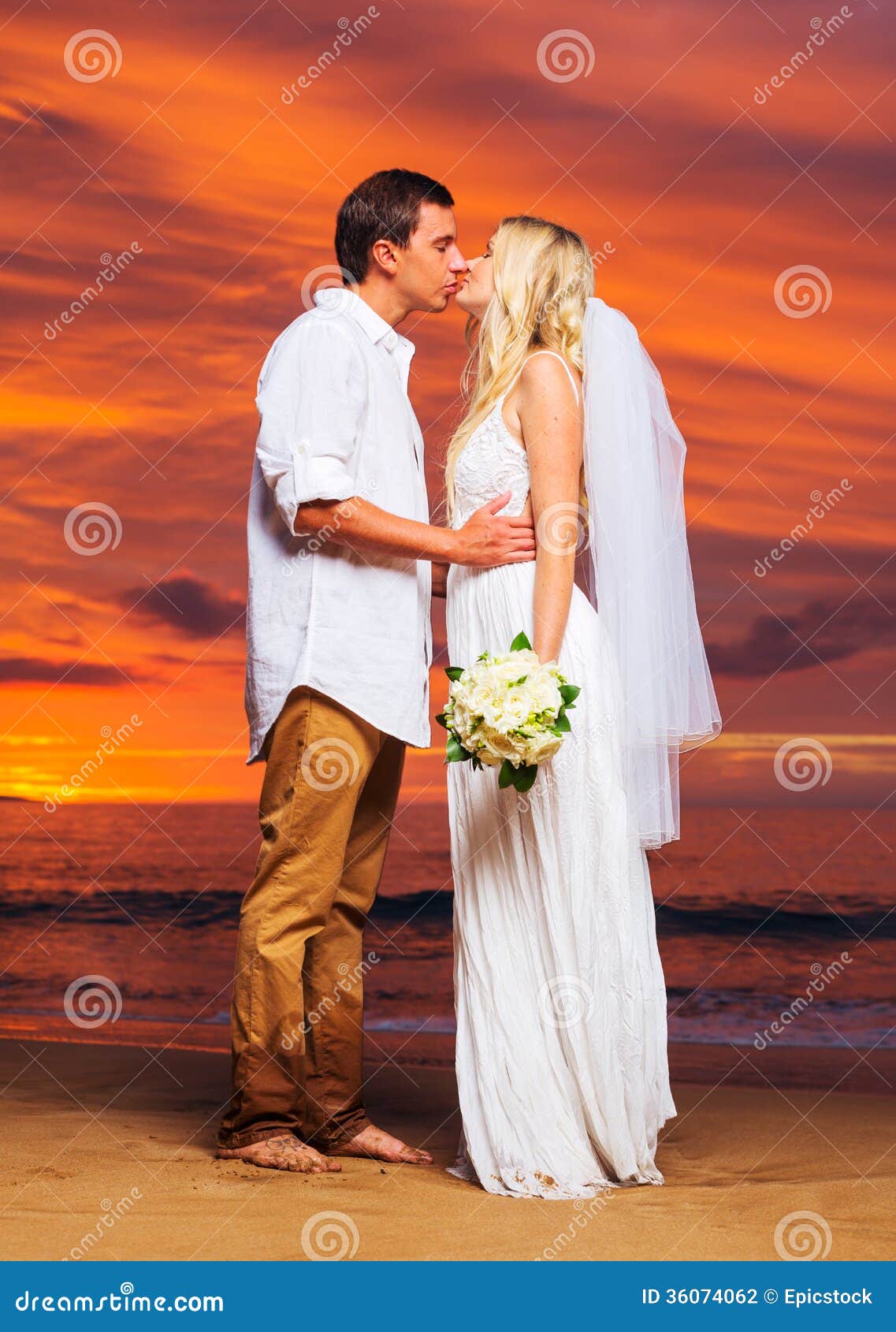 Bride And Groom Enjoying Amazing Sunset On A Beautiful