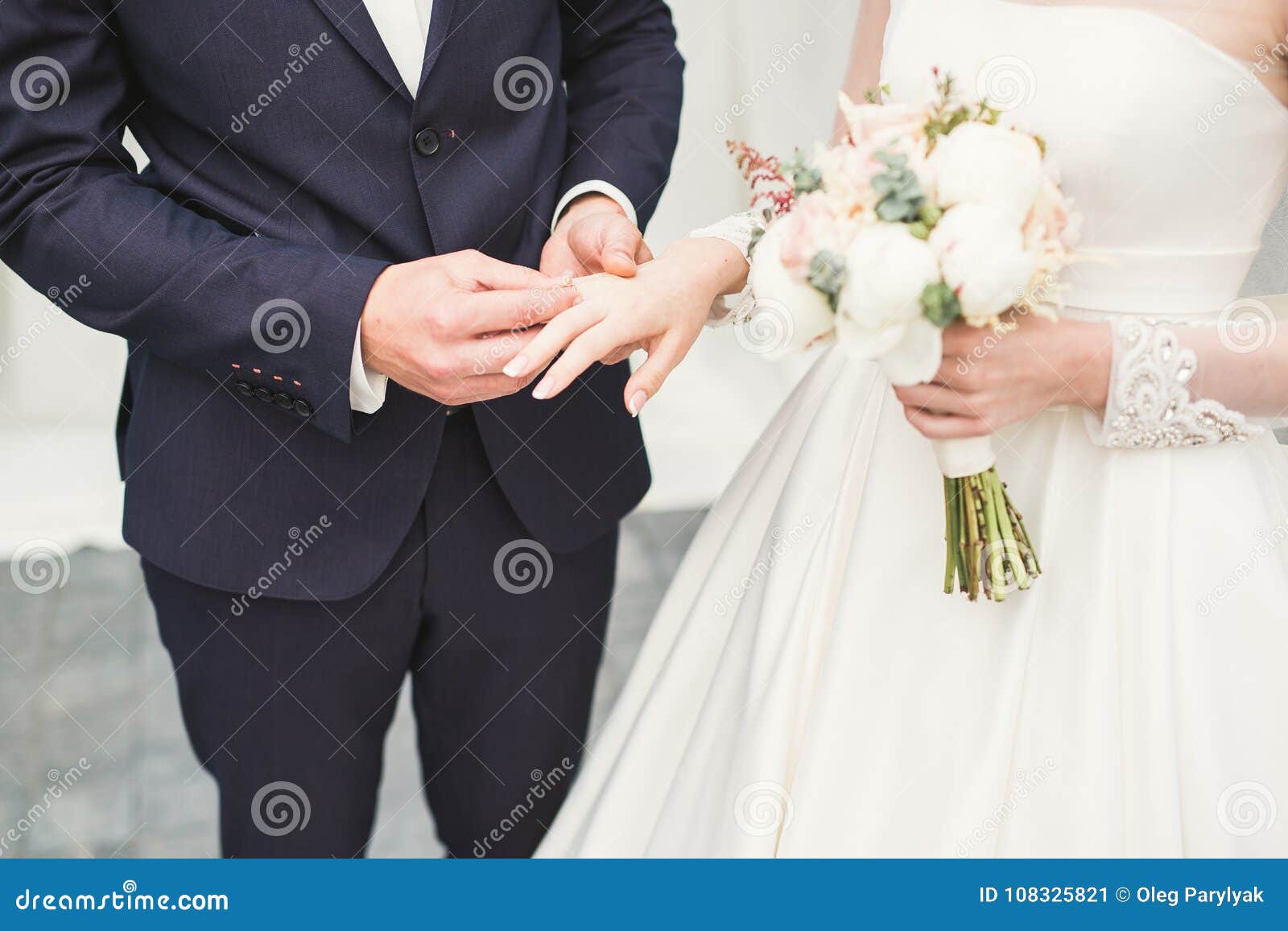 Bride and Groom Exchanging Wedding Rings. Stylish Couple Official ...