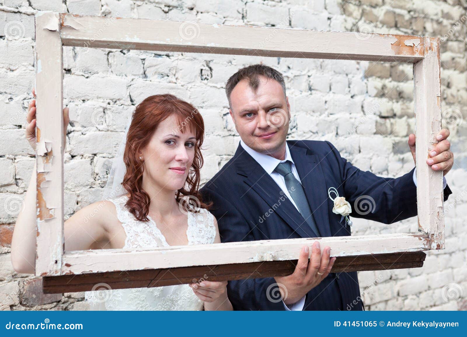 Bride and Groom Hold Portrait Frame Stock Image Image of married