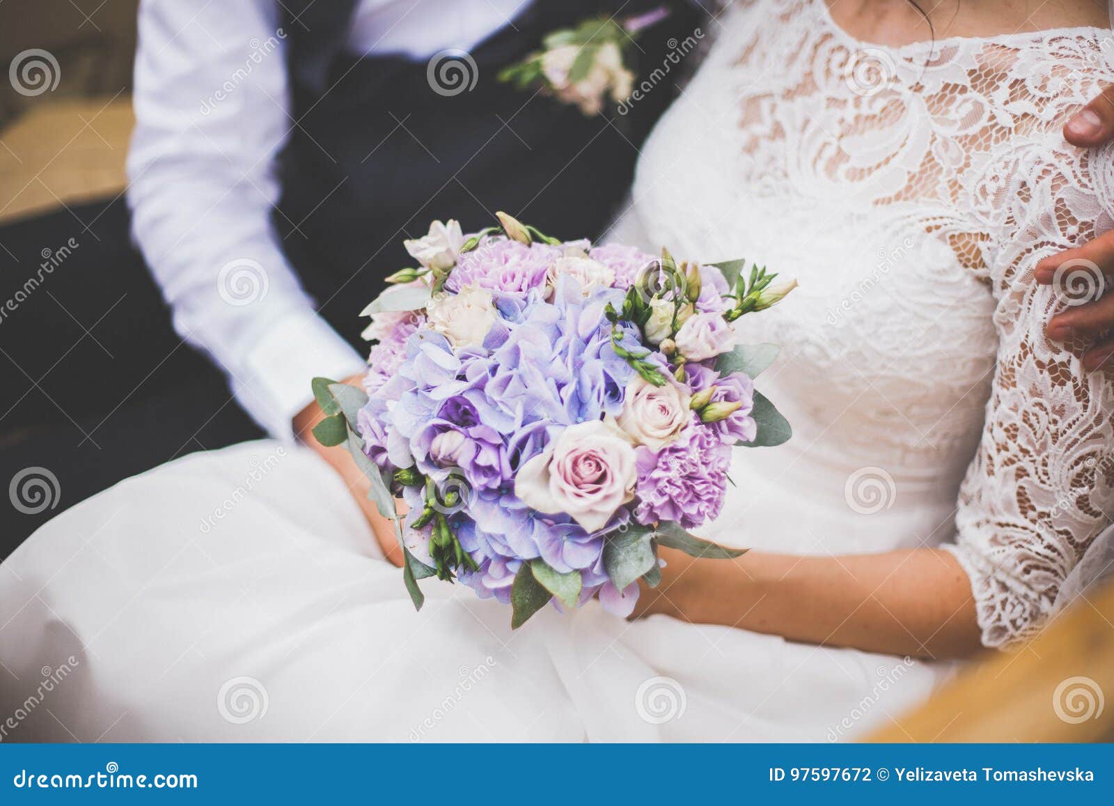 Bride and Groom Holding Bridal Bouquet Stock Photo - Image of floral ...
