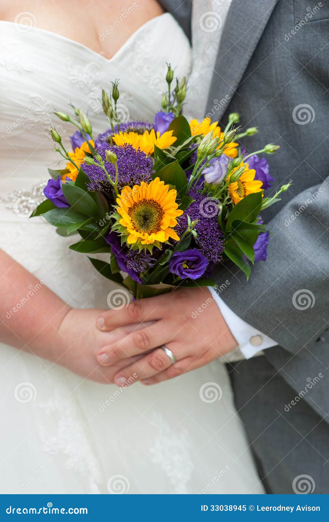 Bride and Groom Holding a Wedding Bouquet Stock Image Image of
