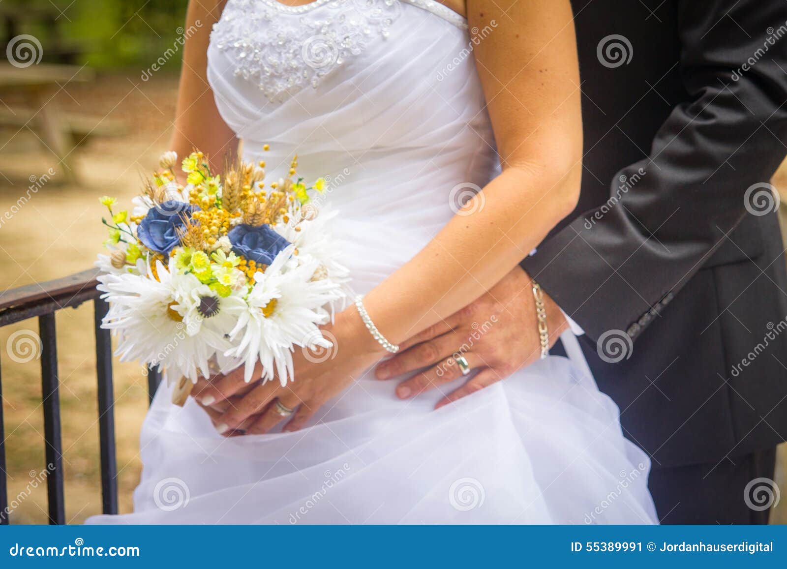 Bride and Groom Posing with Flowers Stock Image - Image of family ...