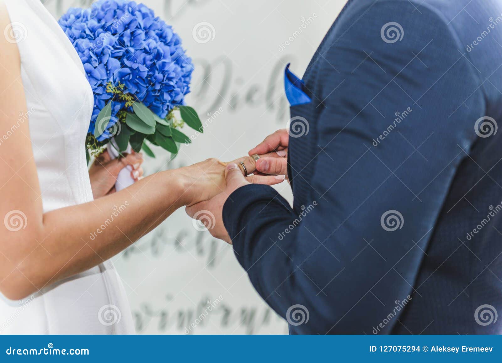 Bride and Groom Wearing Wedding Rings Stock Photo - Image of beautiful ...
