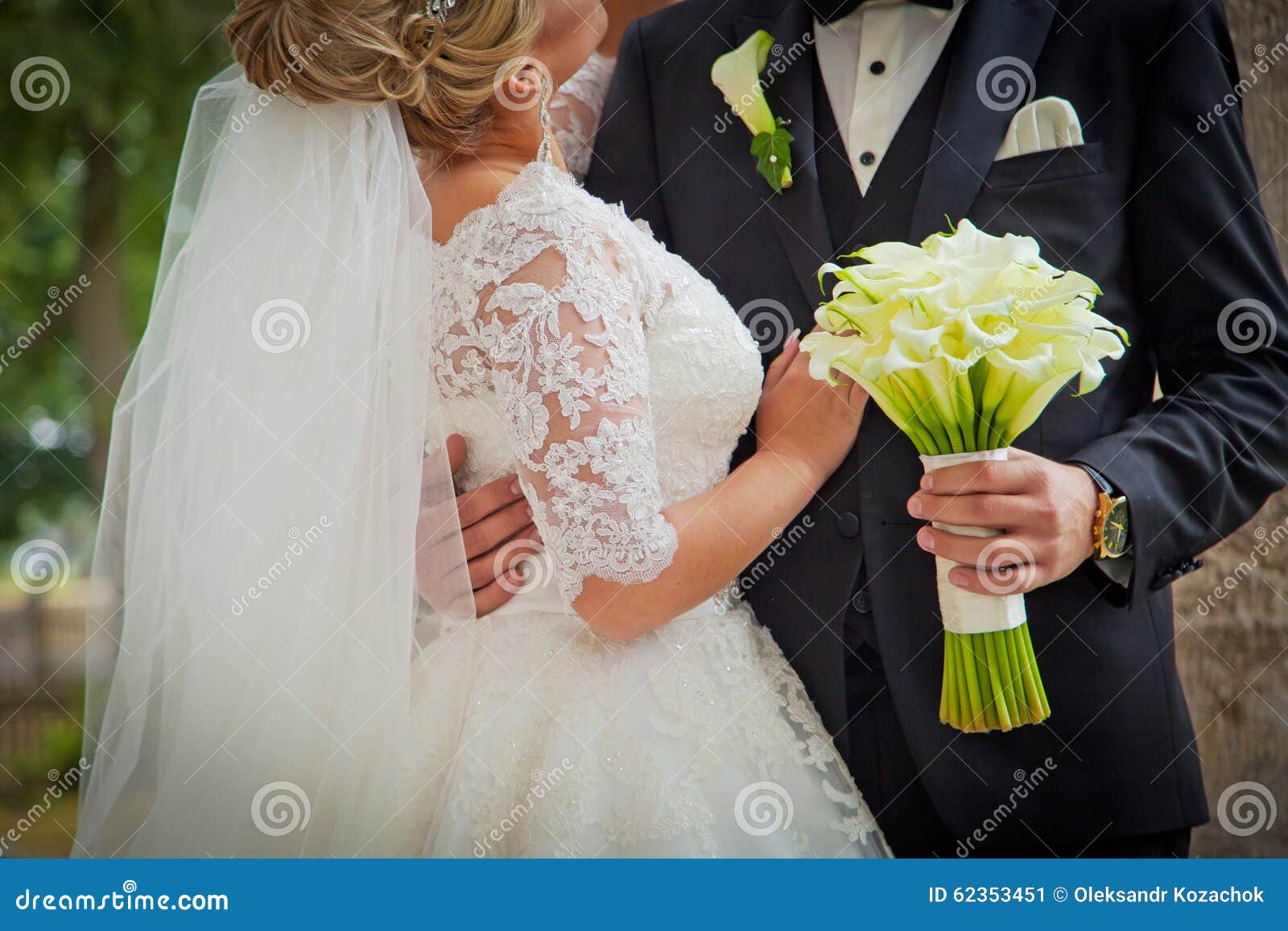 Bride & Groom with Wedding Bouquet. Close Up Background Stock Image ...