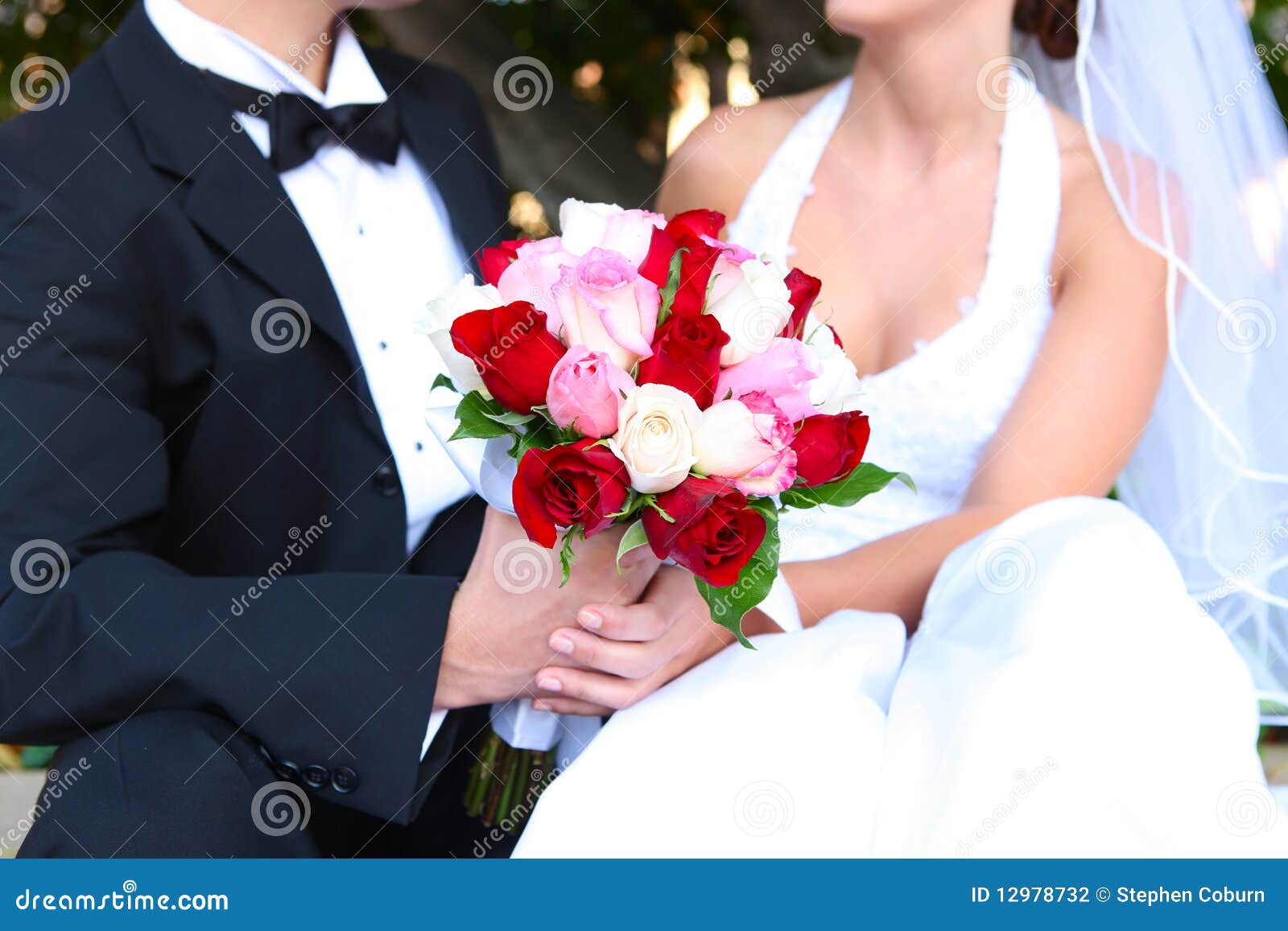 Bride and Groom with Wedding Flowers Stock Photo - Image of evening ...