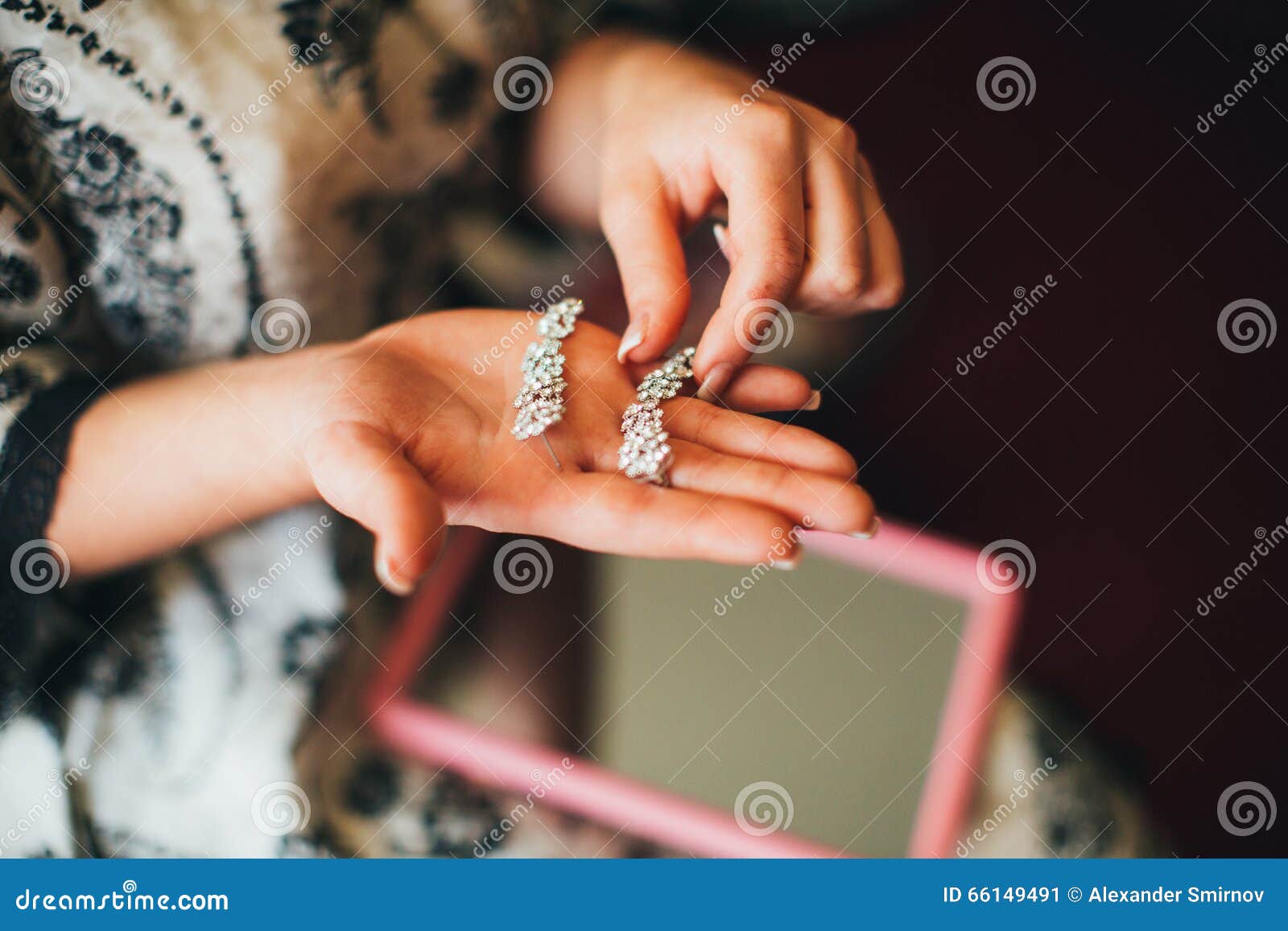 Bride is holding earrings stock image. Image of beauty 66149491