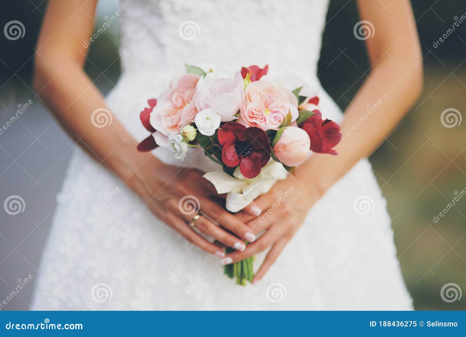 The Bride Holds a Wedding Bouquet. Women`s Hands with Flowers Stock ...