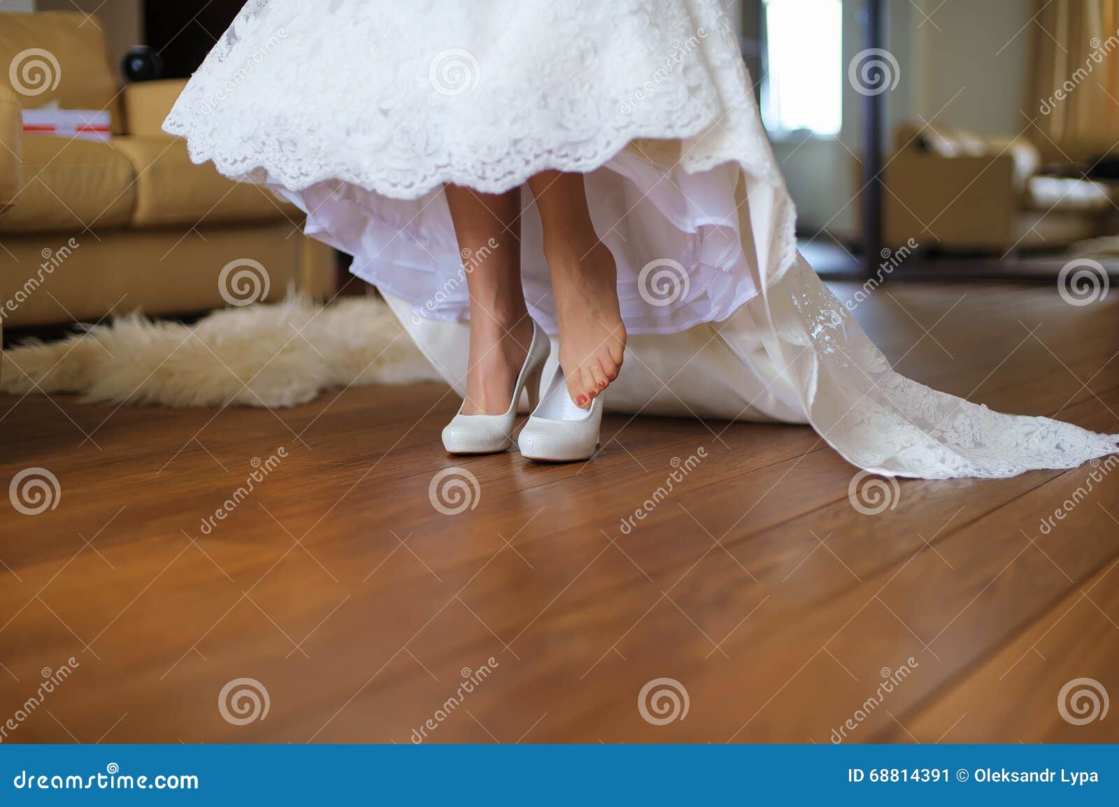 Bride Puts on Shoes in Room Stock Image - Image of concept, female ...