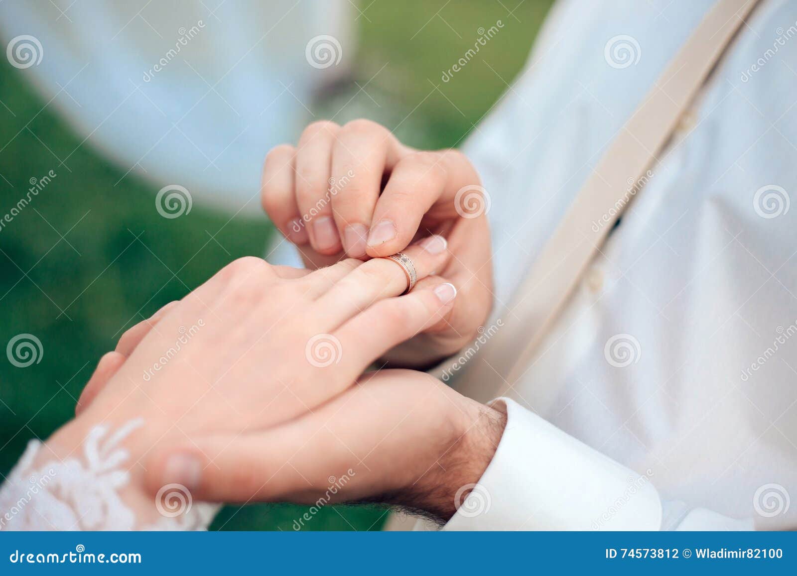 Bride Putting a Wedding Ring on Finger Stock Photo Image of spouse