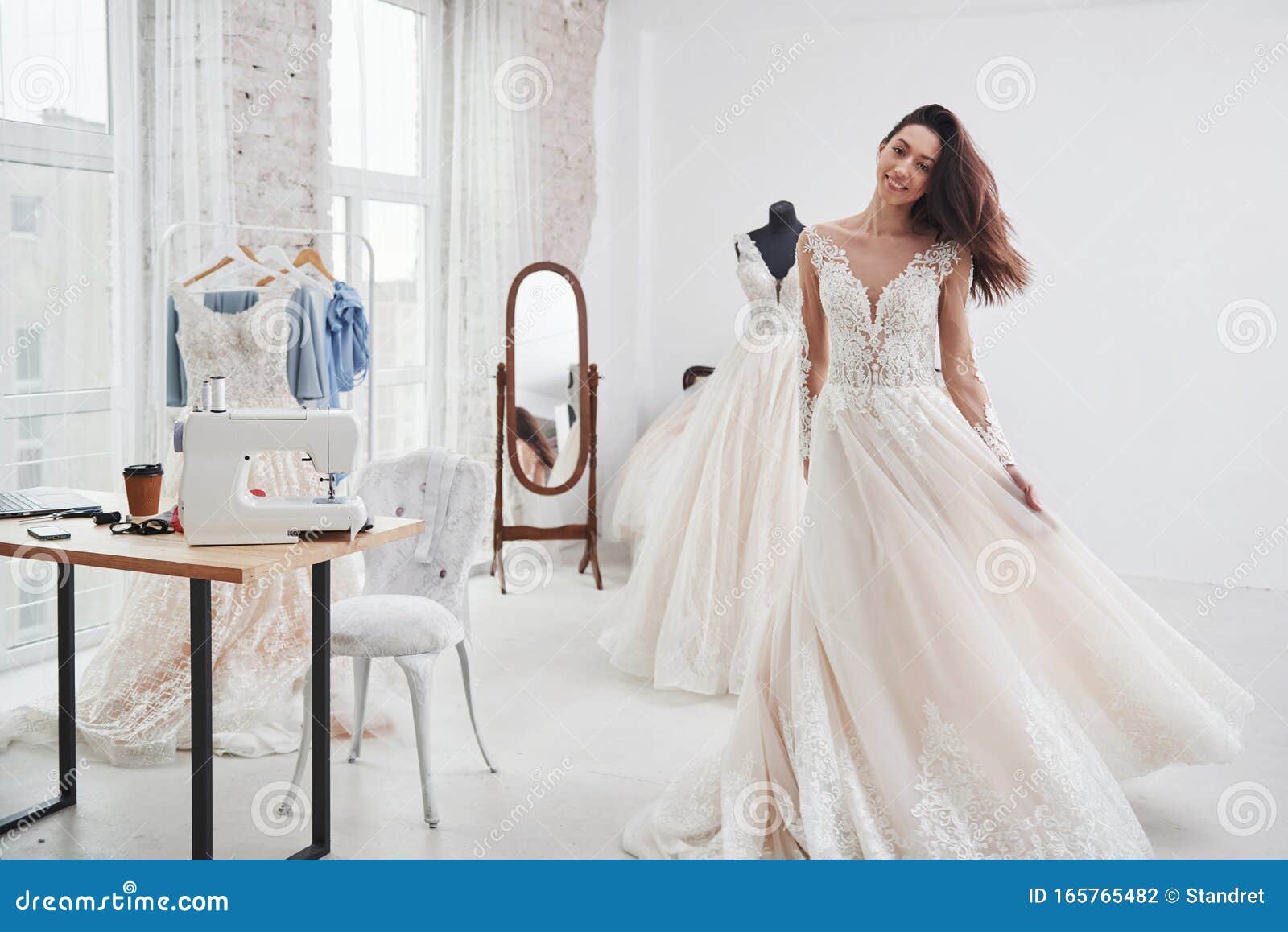 Bride is Ready for Her Wedding. the Process of Fitting the Dress in the