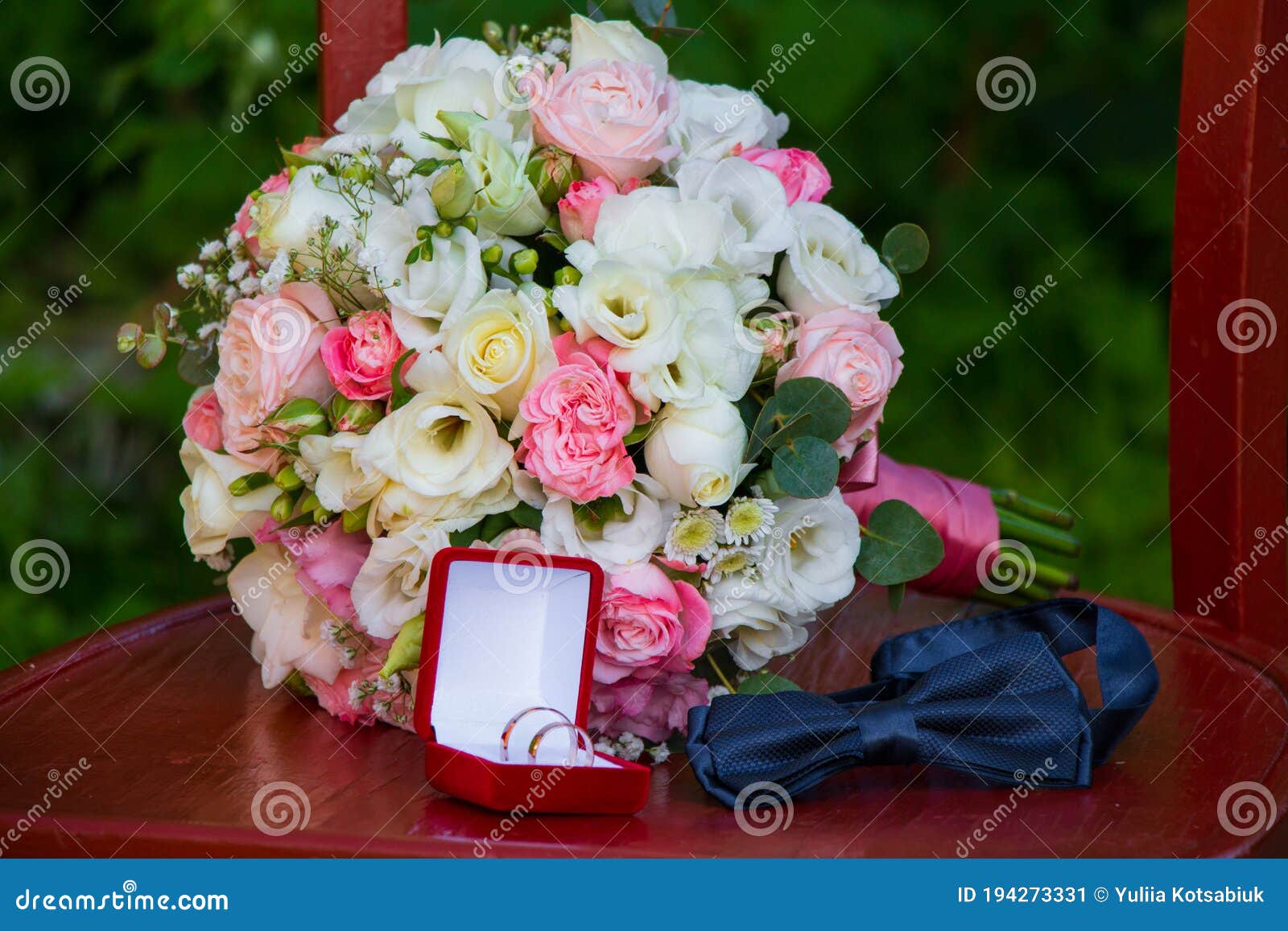Bride S Wedding Bouquet Of White And Pink Flowers Blue Bow Tie Next To Gold Wedding Rings In A Red Box White And Pink Roses Stock Image Image Of Arrangement Floral 194273331