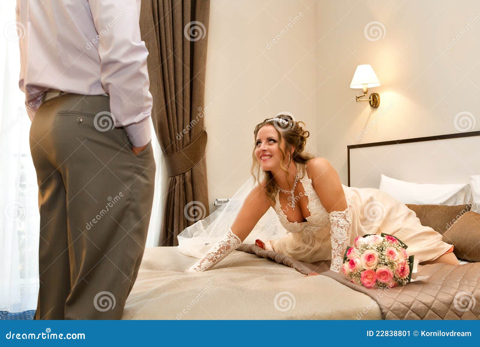 bride waiting for her sweetheart on bed