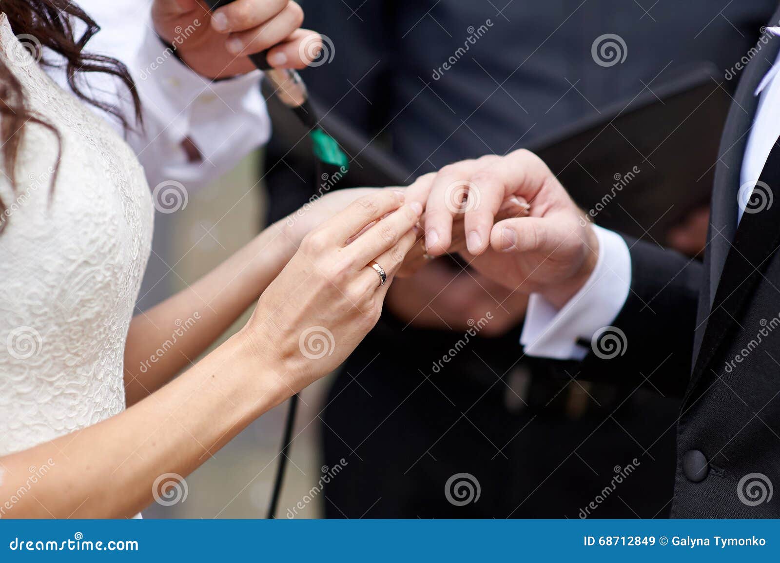 Bride Wears a Wedding Ring on Finger of Groom Stock Image Image of