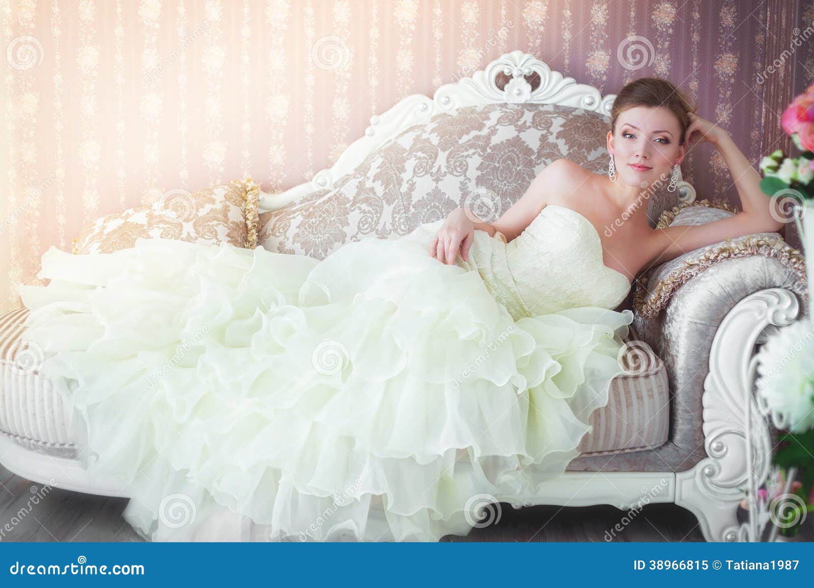 Bride in Wedding Dress Sitting on the Couch Stock Image Image of