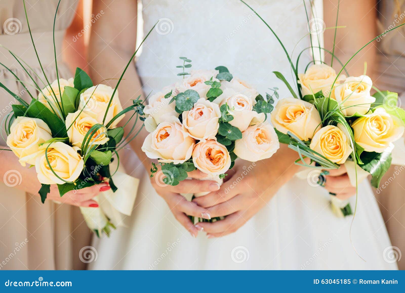 Bridesmaid Dresses Are Holding Bouquets In A Rustic Style Stock