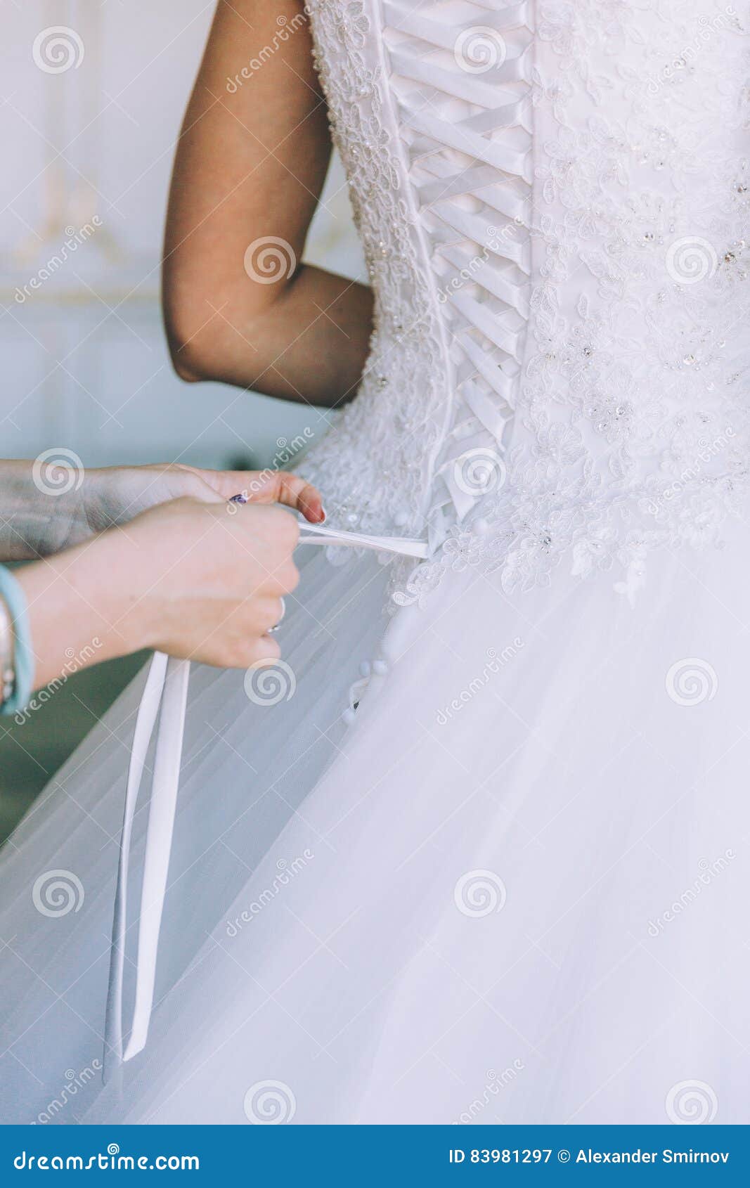 Bridesmaid Tying Bow on Dress Stock Image Image of dress, beauty