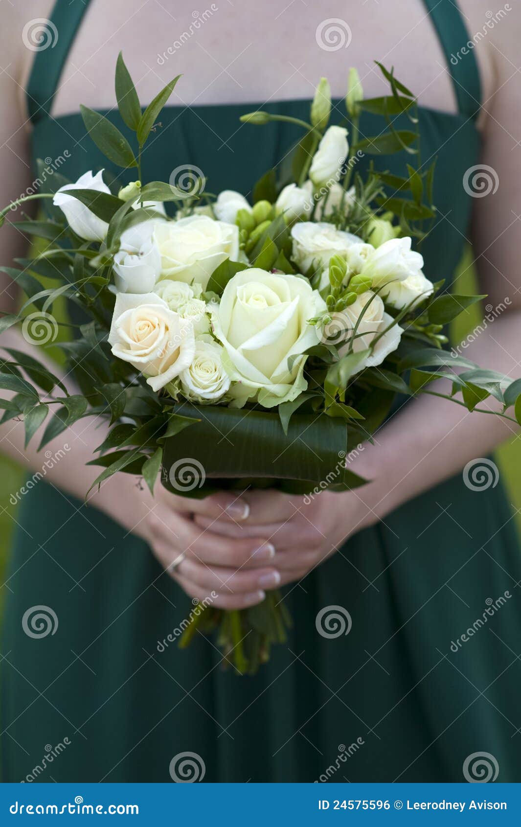 Bridesmaids hold flowers stock photo. Image of bouquet 24575596