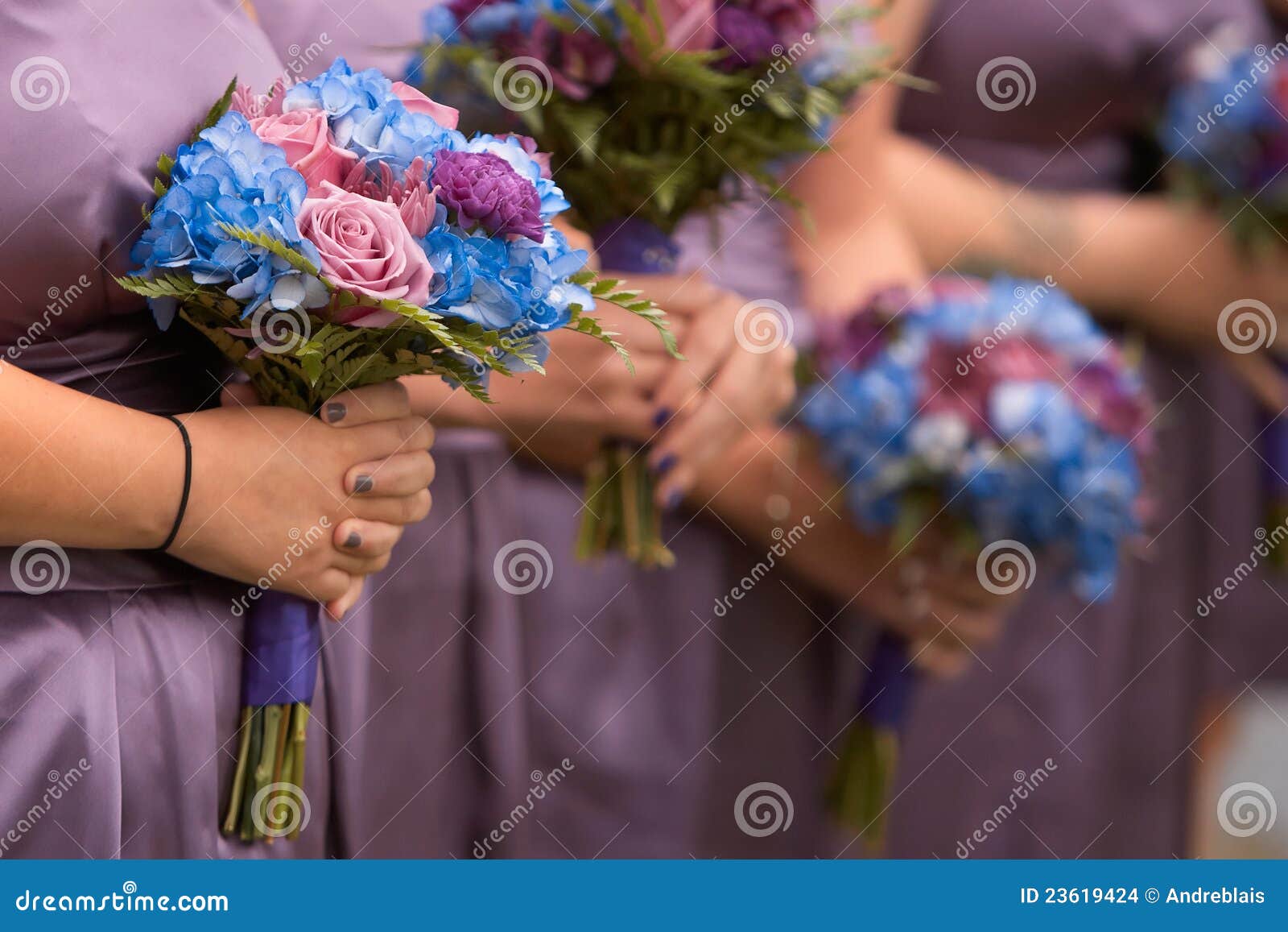 bridesmaids holding bouquets