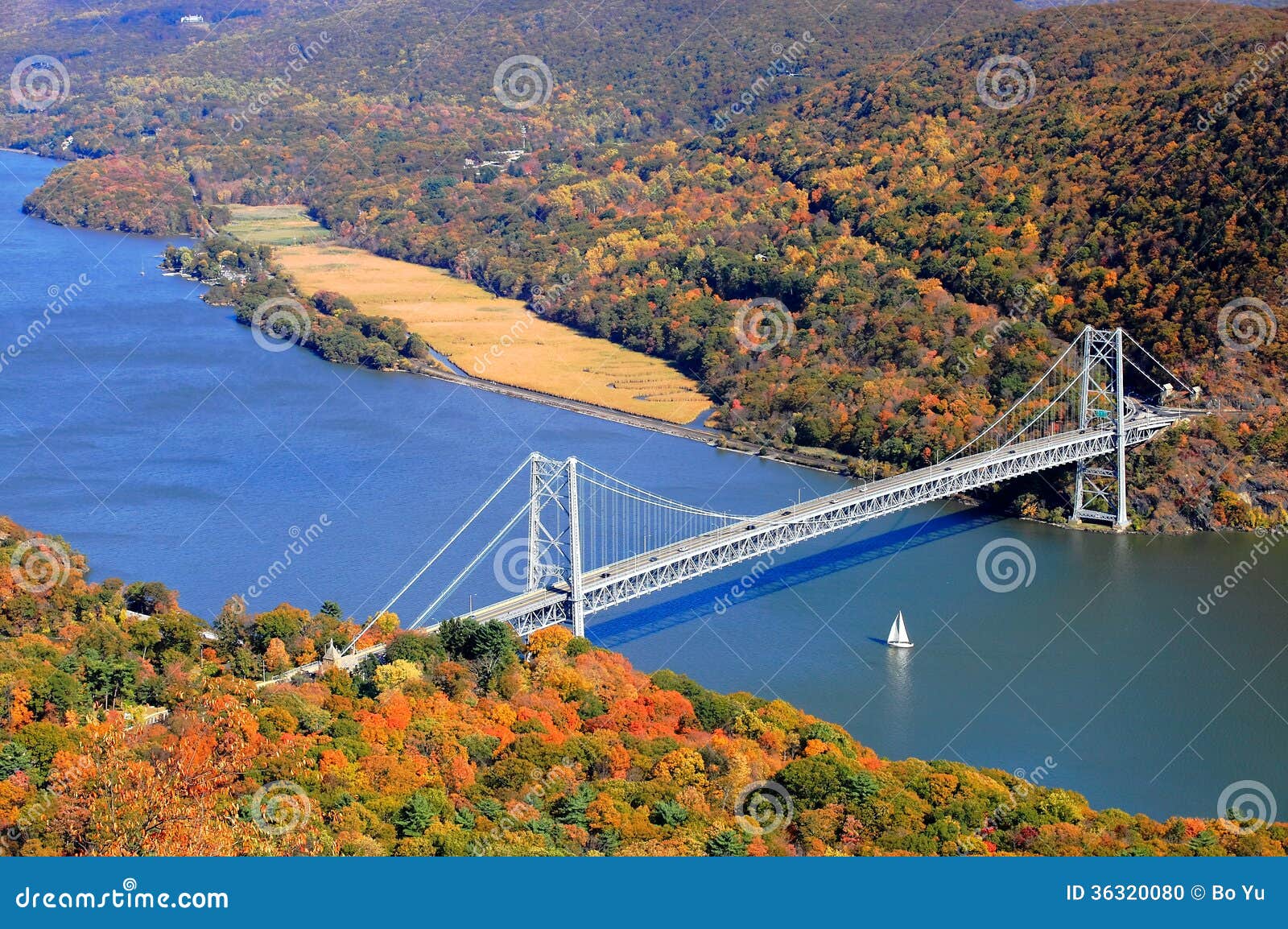 bridge and sailboat over the hudson river valley i