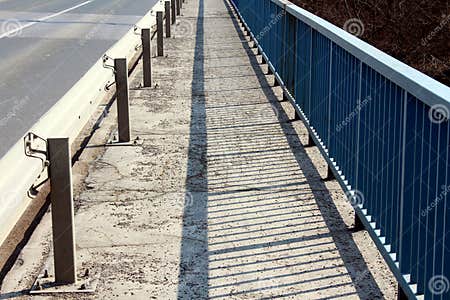 Bridge Sidewalk with Guardrail and Fence Stock Image - Image of warm ...