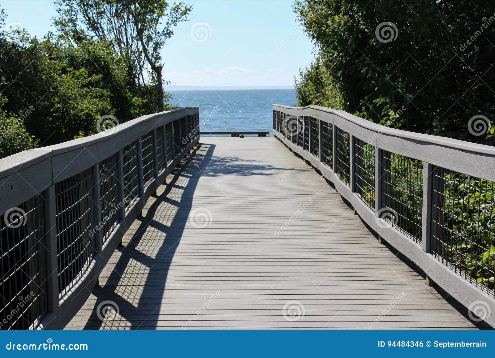 A bridge to a beach stock photo. Image of early, moment 94484346