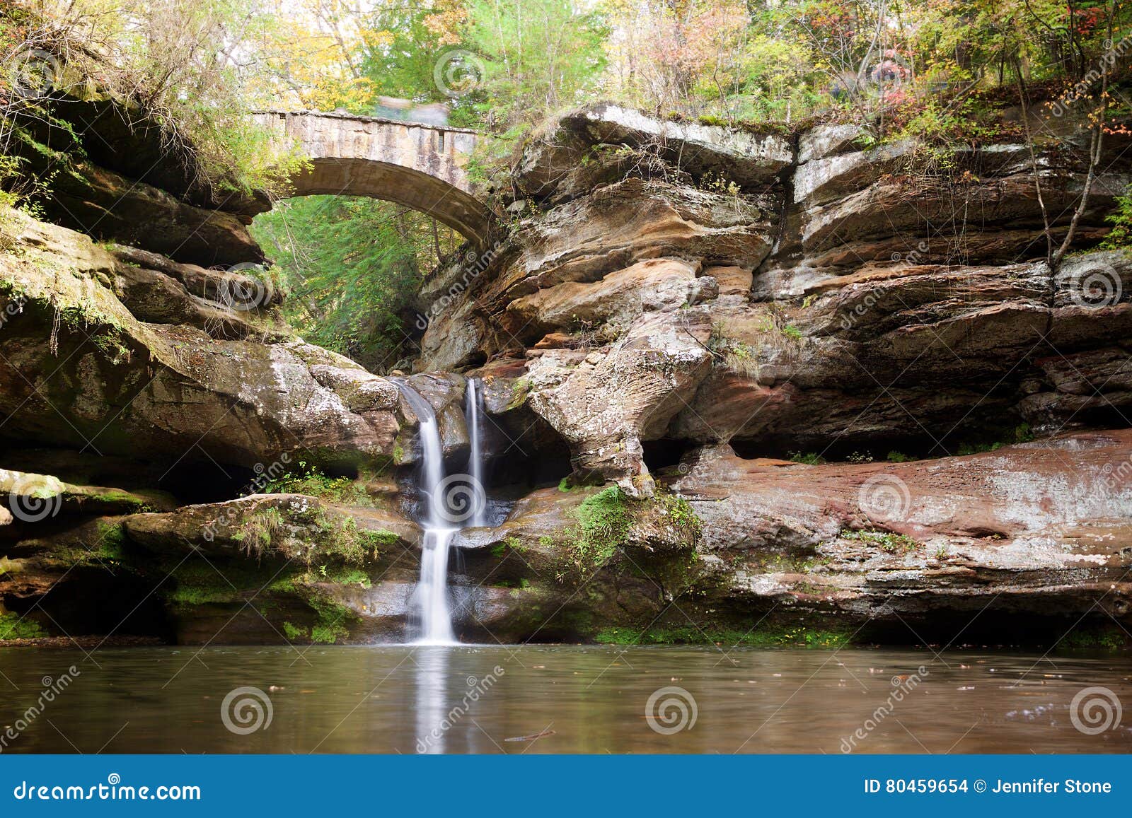 bridge and waterfall in hocking hills state park, ohio